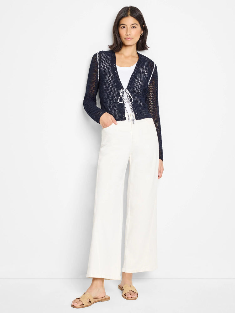 Navy blue mesh cardigan with white trim and ties. Long sleeves.