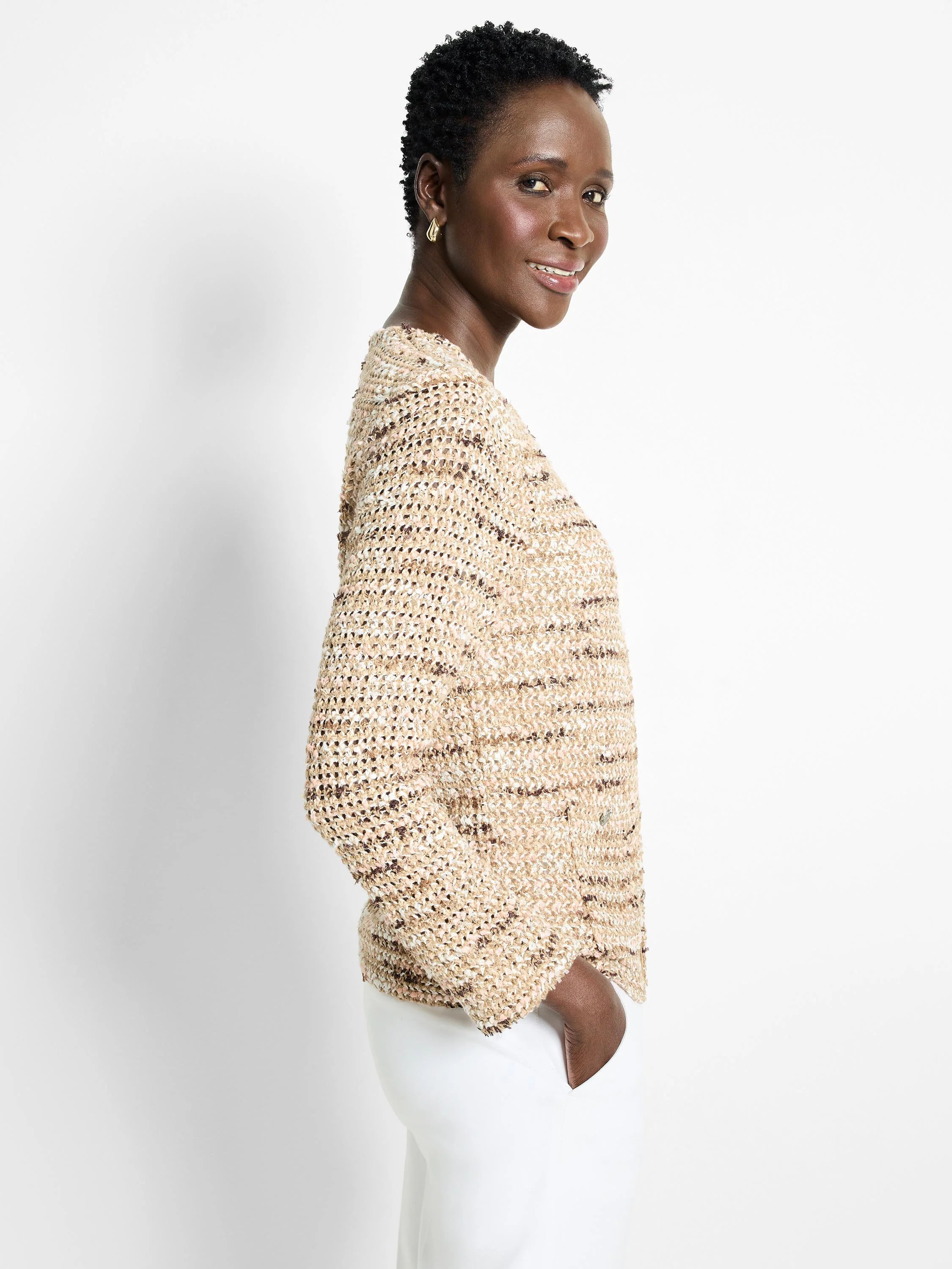 Beige knit jacket with brown and white flecks.  Long sleeves, relaxed fit.