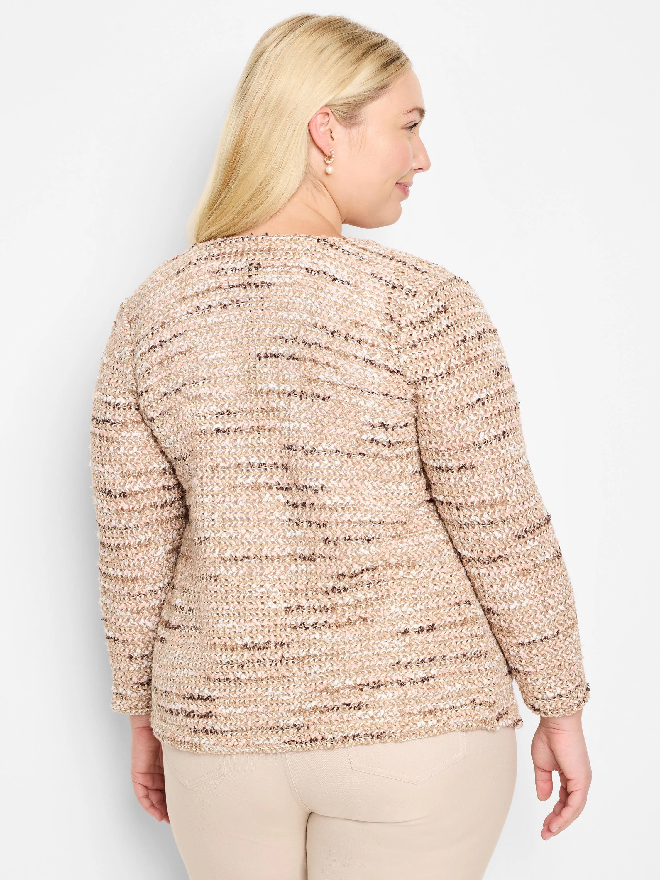 Beige knit jacket with subtle pink and brown flecks.  Long sleeves, close-fitting.