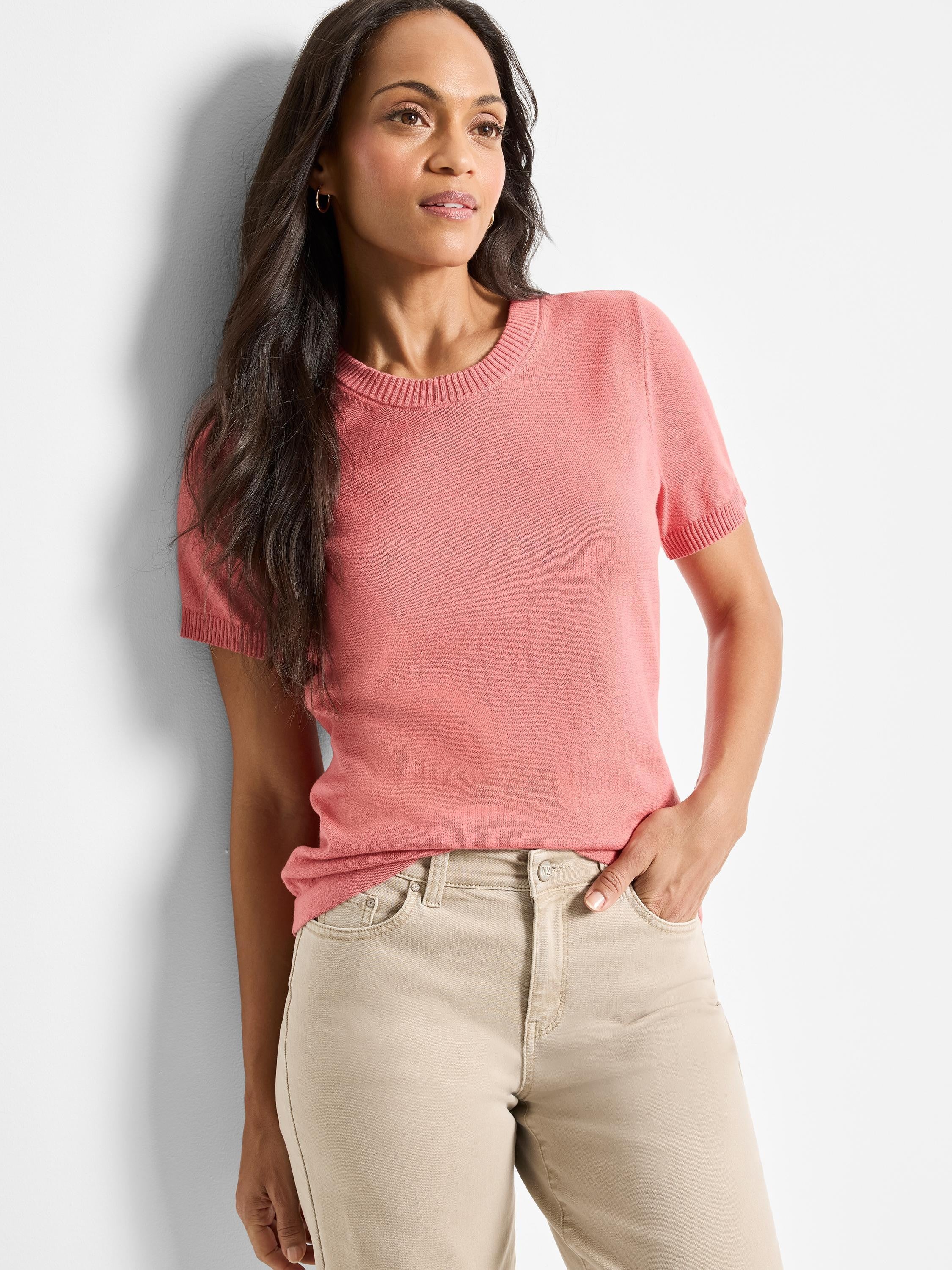 Pink cotton sweater tee with short sleeves and scoop neck.
