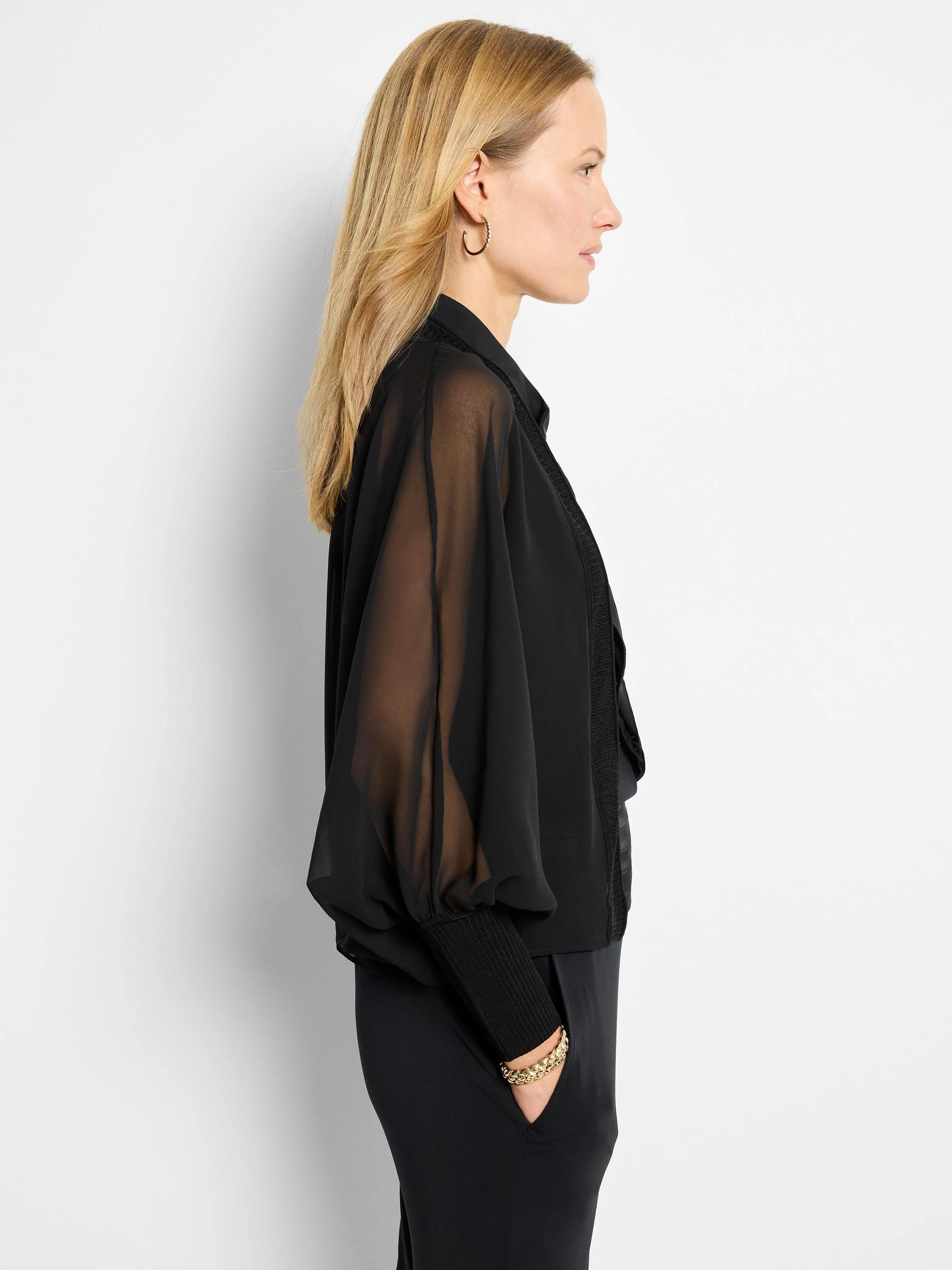 Black chiffon cardigan. Sheer sleeves, fitted cuffs. Slightly cropped.