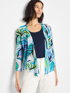 Open, 3/4 sleeve cardigan; light blue, teal, green abstract print on light background.