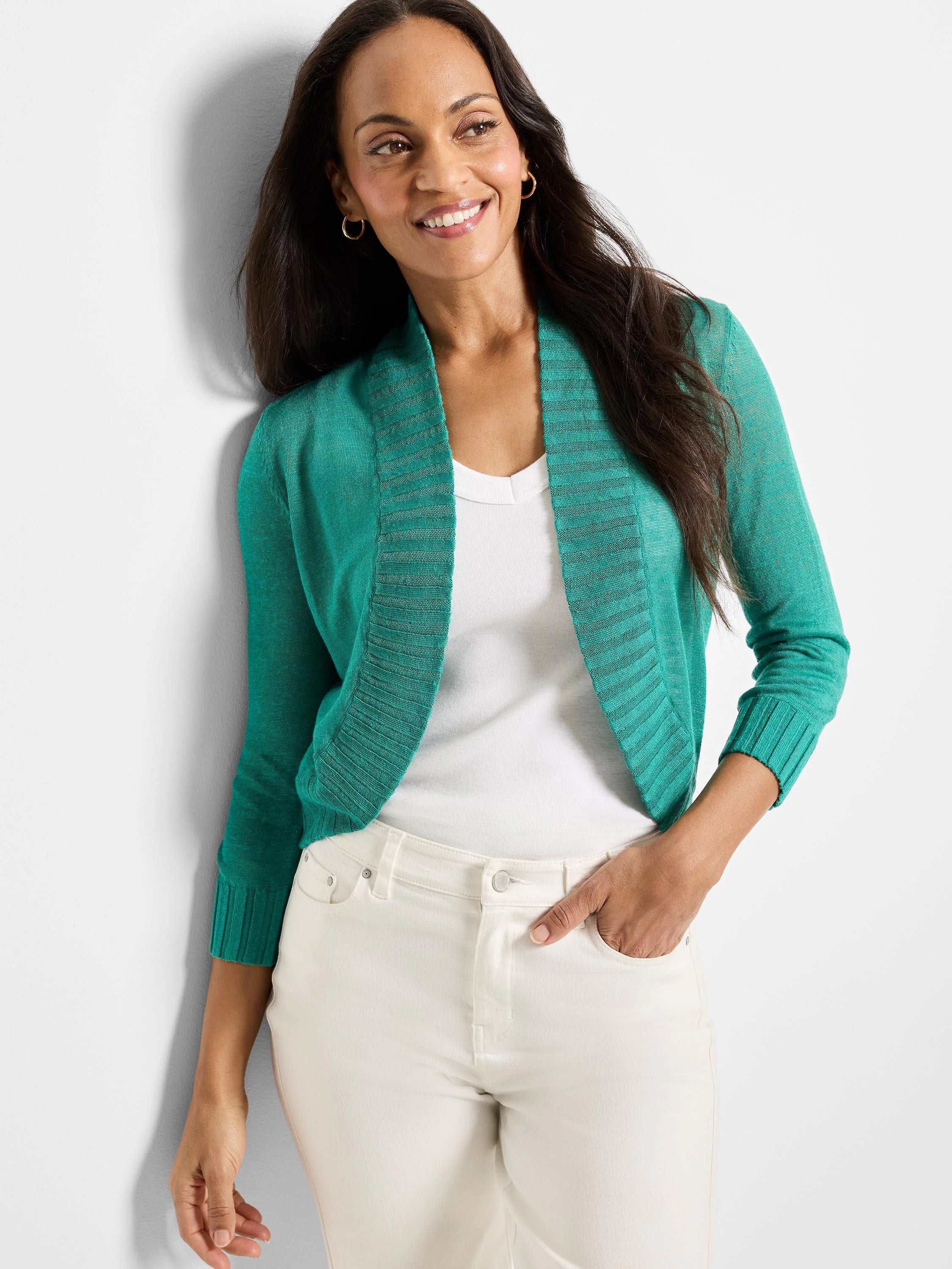Teal bolero cardigan, open-front, 3/4 sleeves, with ribbed edges and cuffs.