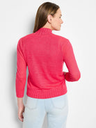 Bright pink, lightweight knit bolero top with mock neck, 3/4 sleeves, ribbed trim, shown from back.