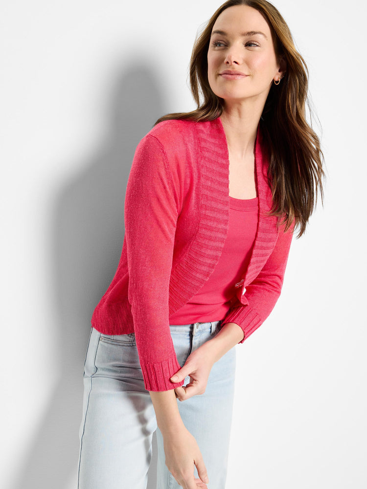 Fuchsia pink bolero cardigan with long sleeves, a ribbed shawl collar, and a single front button closure.