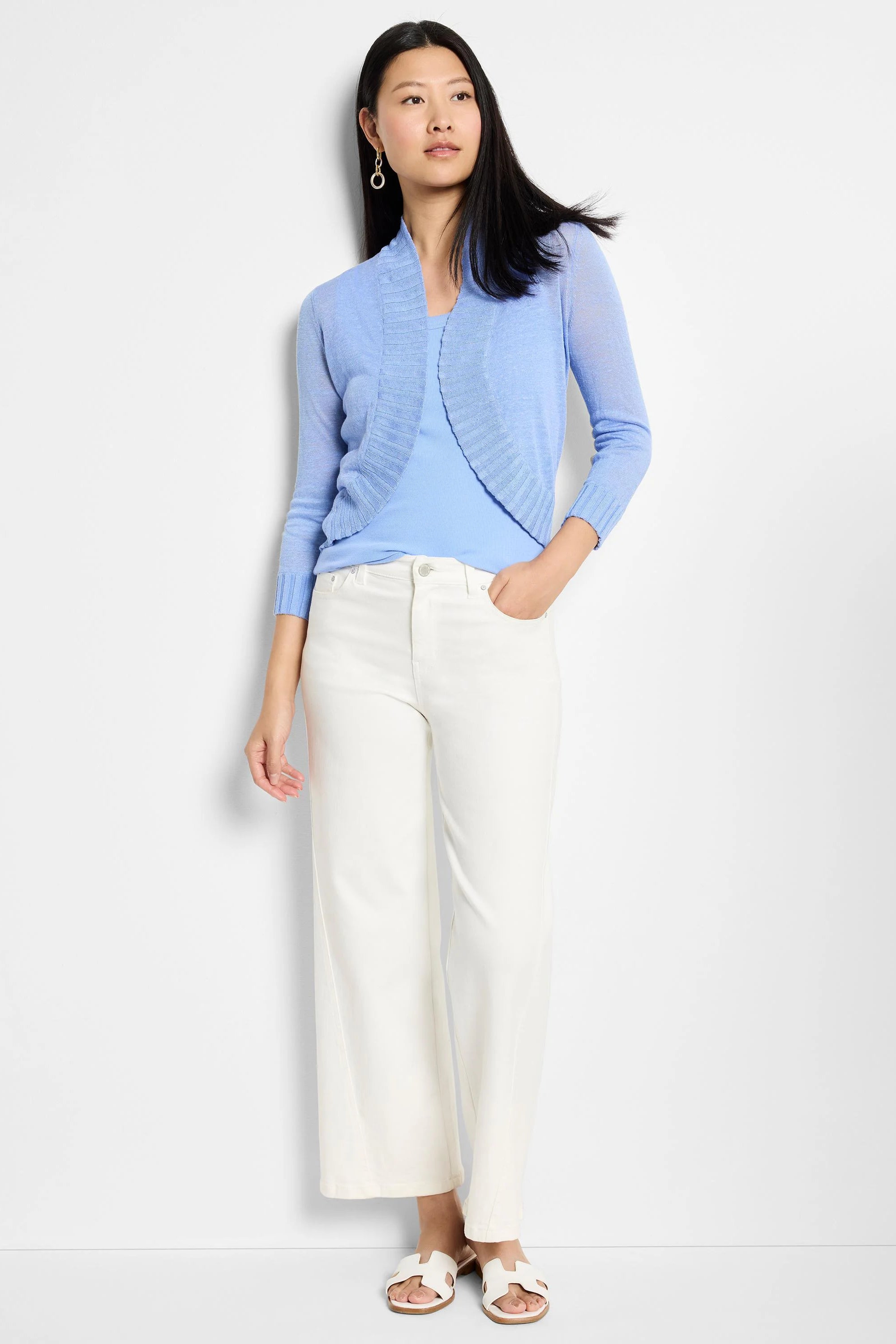 Light blue bolero cardigan, 3/4 sleeves, open draped front. Lightweight, fine knit.