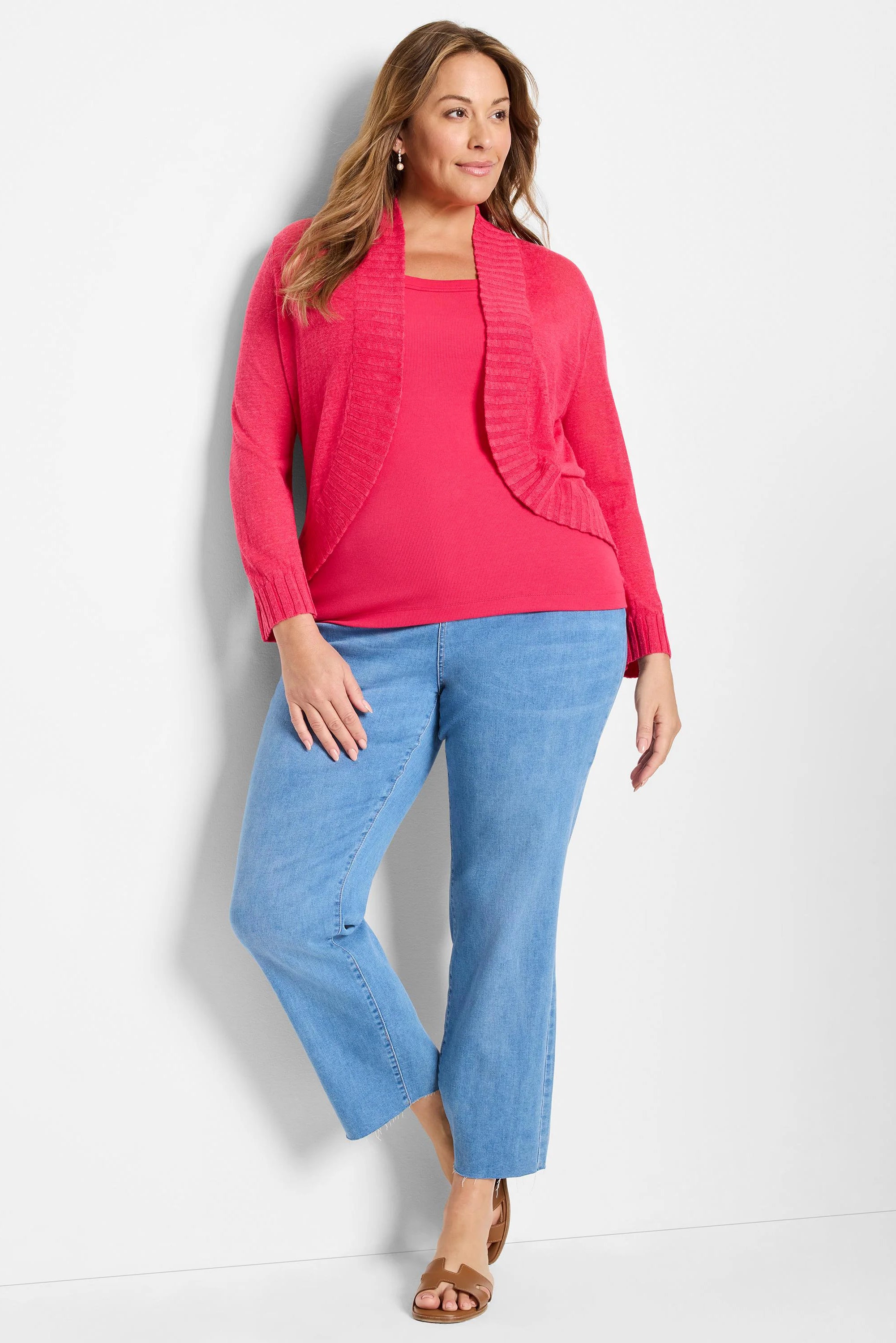 Fuchsia knit bolero cardigan, open front with a ribbed collar.
