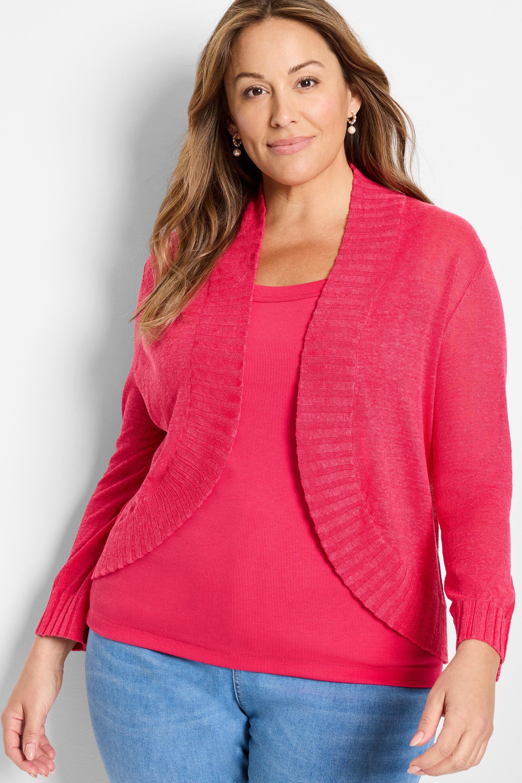 Fuchsia bolero cardigan, cropped, open front, lightweight knit with ribbed trim.