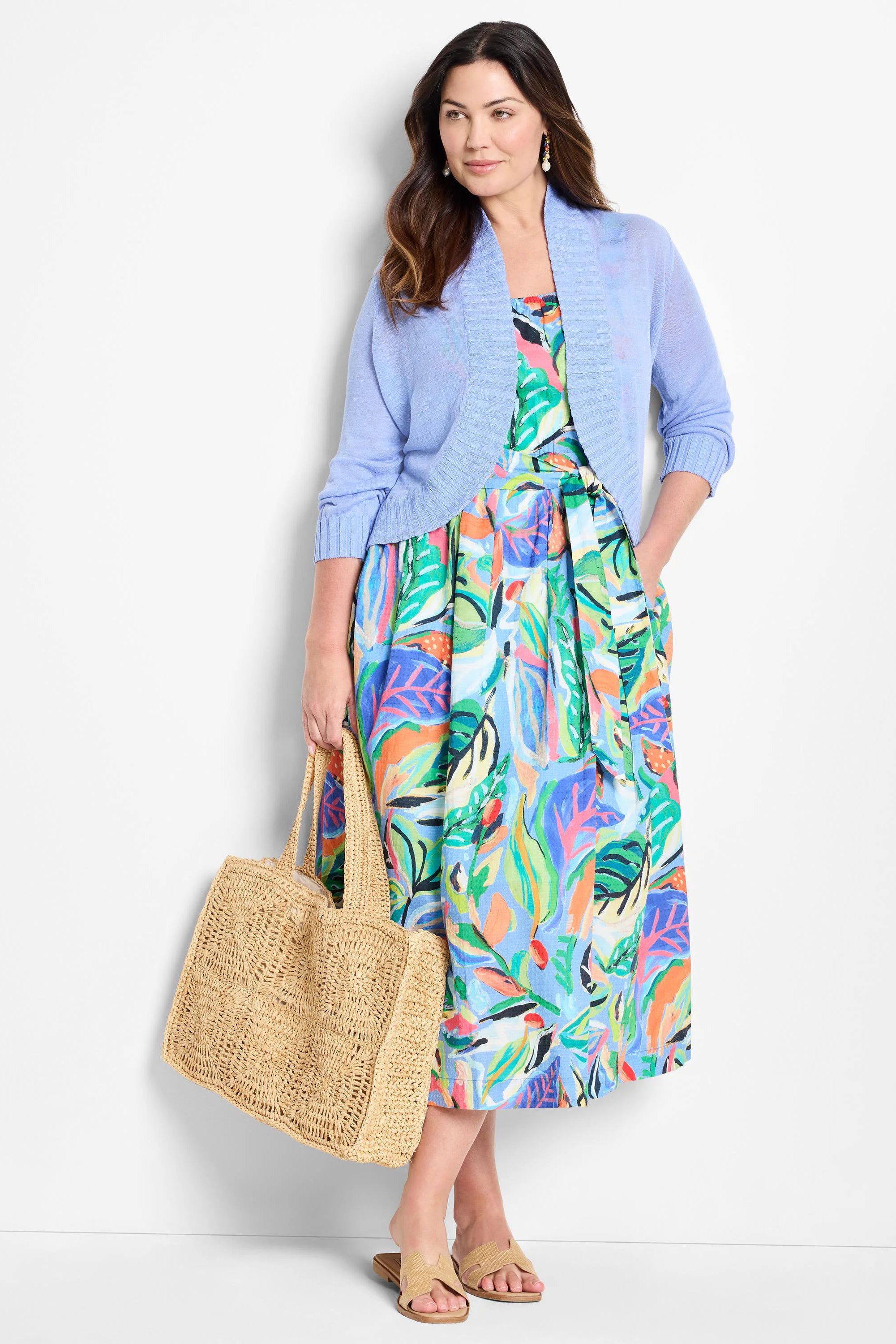 Light blue bolero cardigan features 3/4 sleeves, ribbed cuffs, and an open-front design.