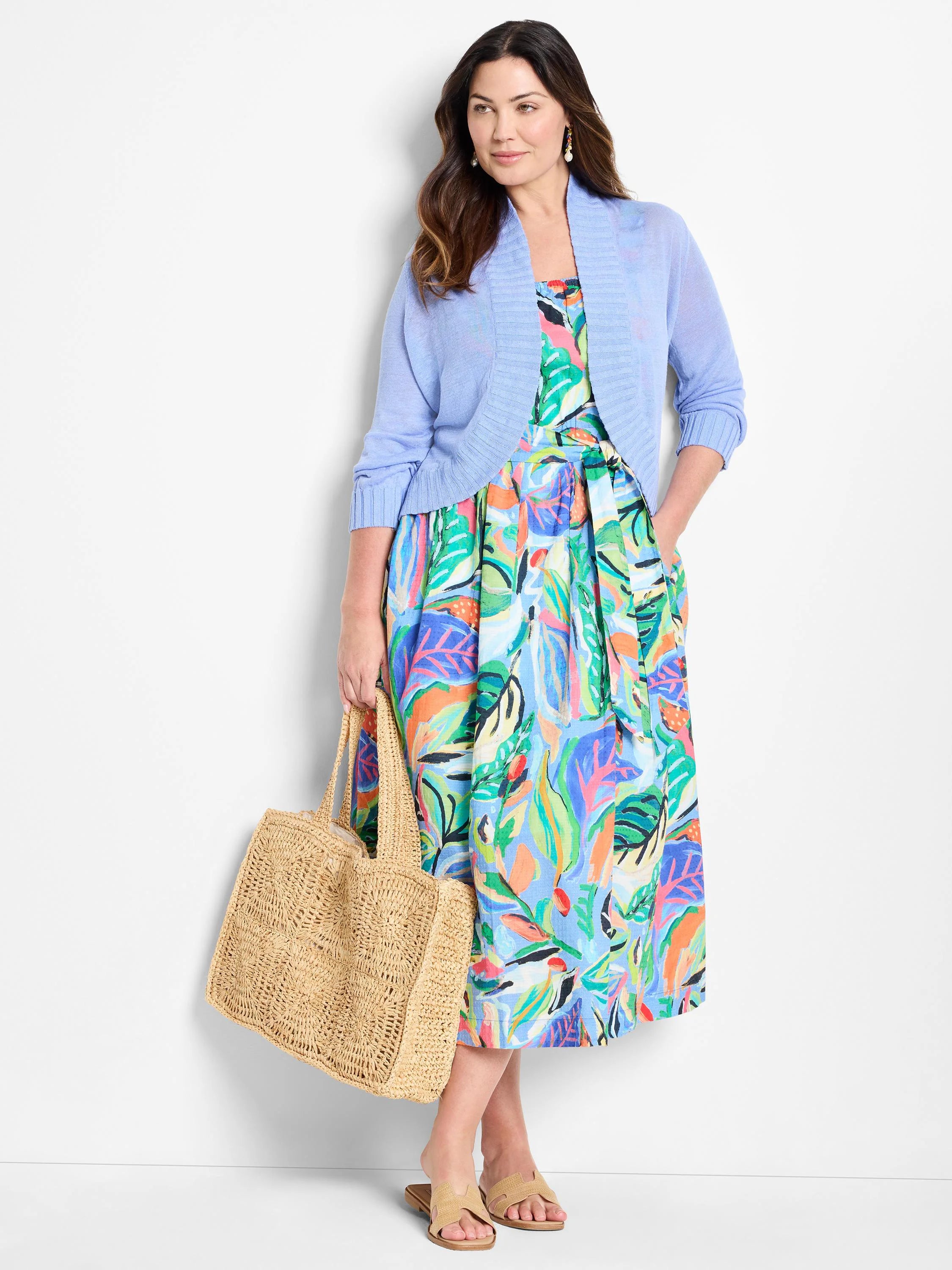 Light blue bolero cardigan features 3/4 sleeves, ribbed cuffs, and an open-front design.