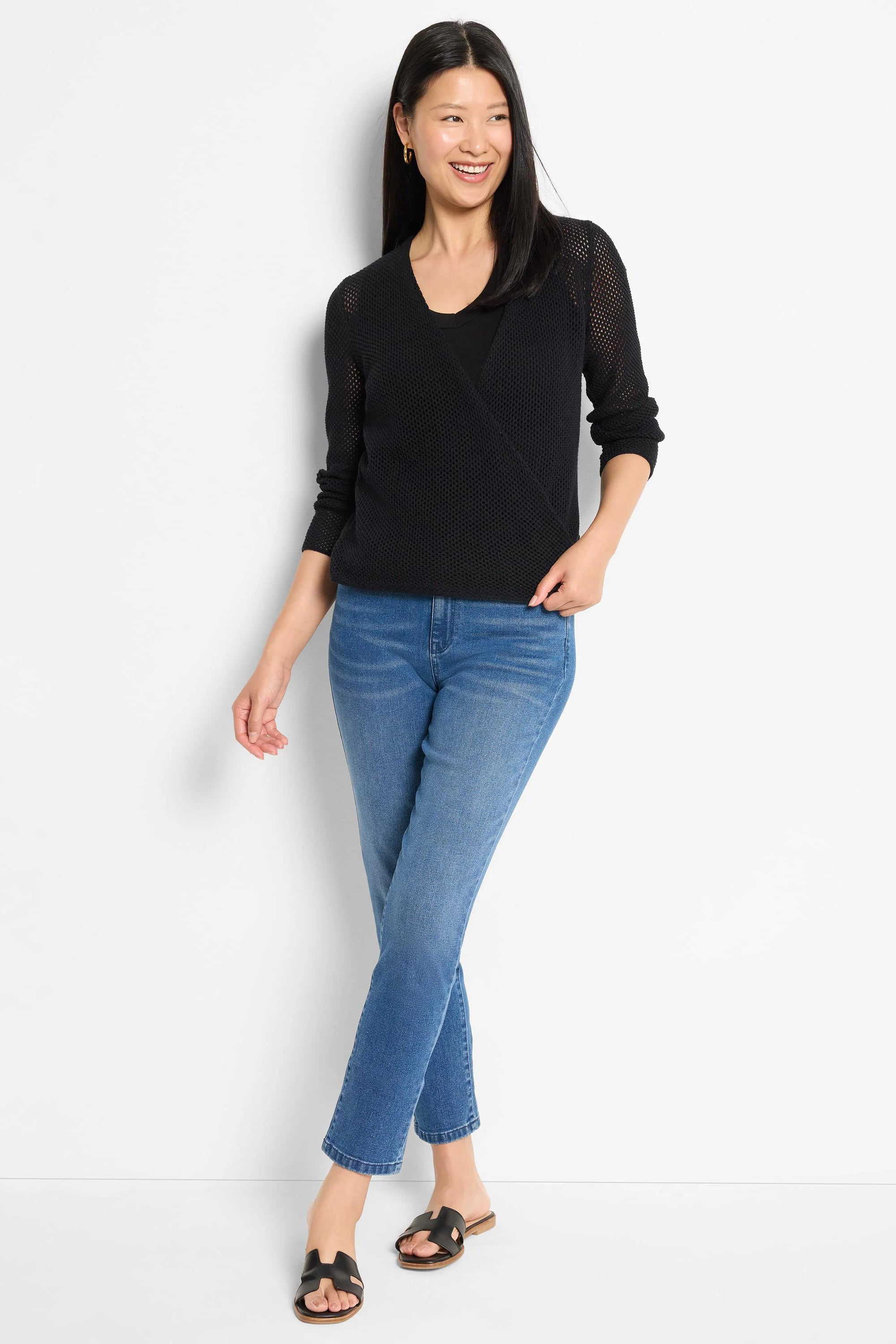 Black mesh knit wrap cardigan with V-neck and long sleeves.