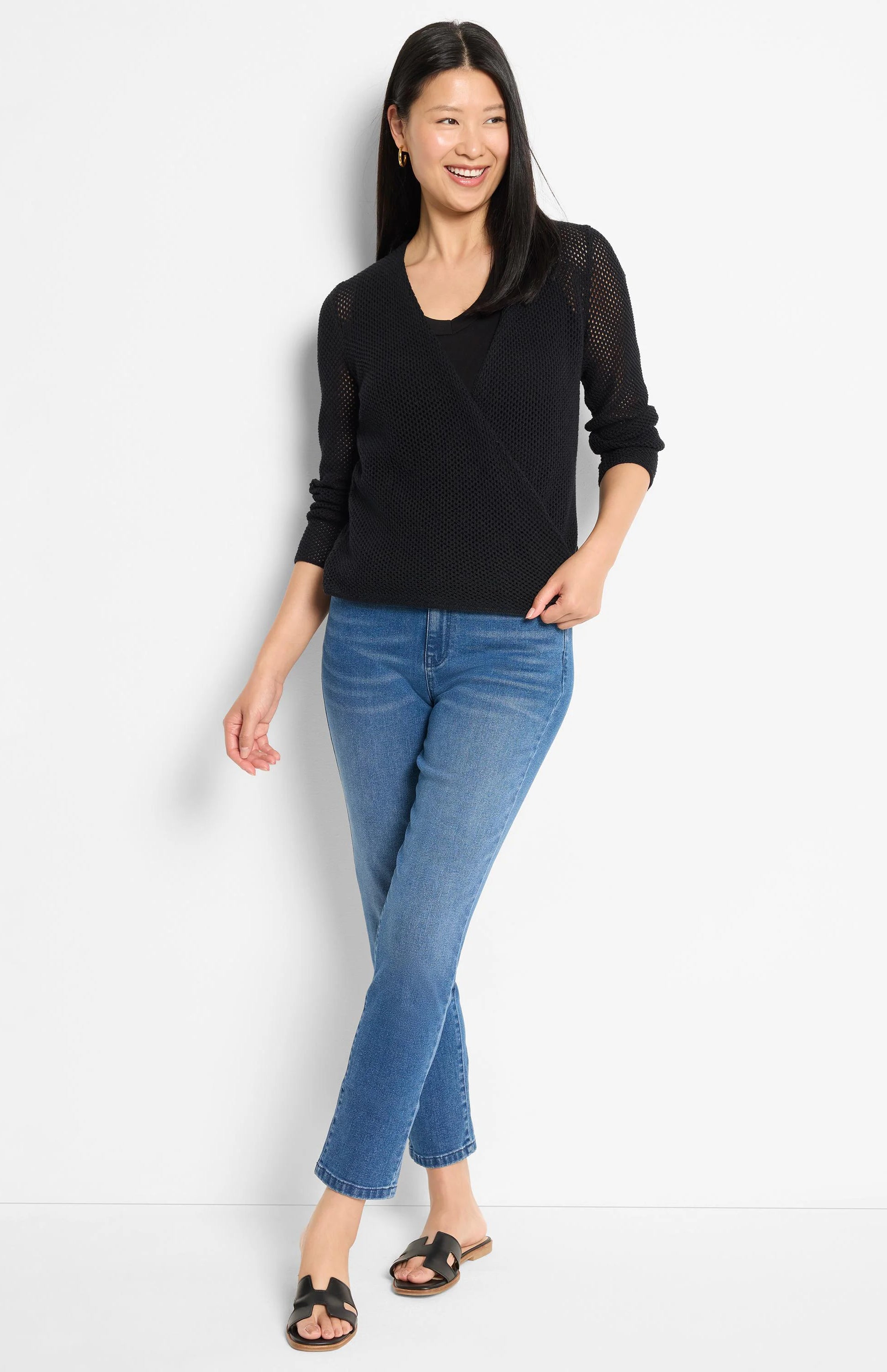 Black mesh knit wrap cardigan with V-neck and long sleeves.