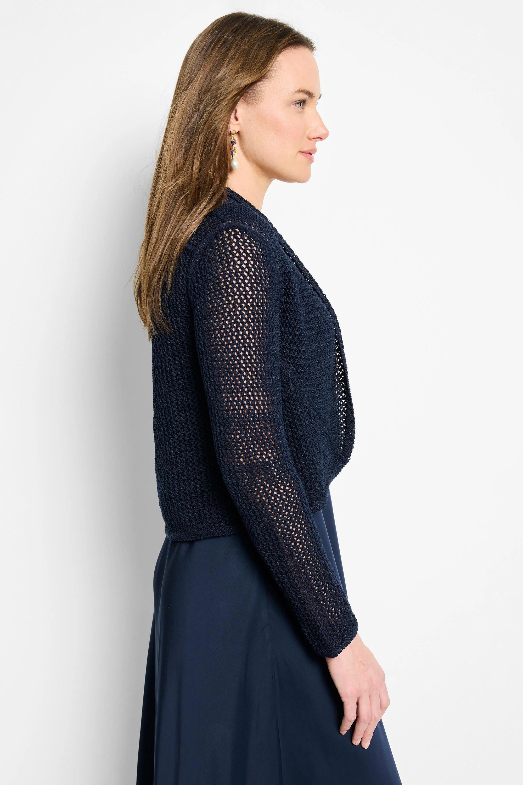 Navy mesh cocoon cardigan. Features open-knit pattern on sleeves and an open front.