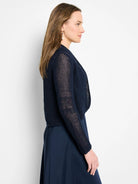 Navy mesh cocoon cardigan. Features open-knit pattern on sleeves and an open front.