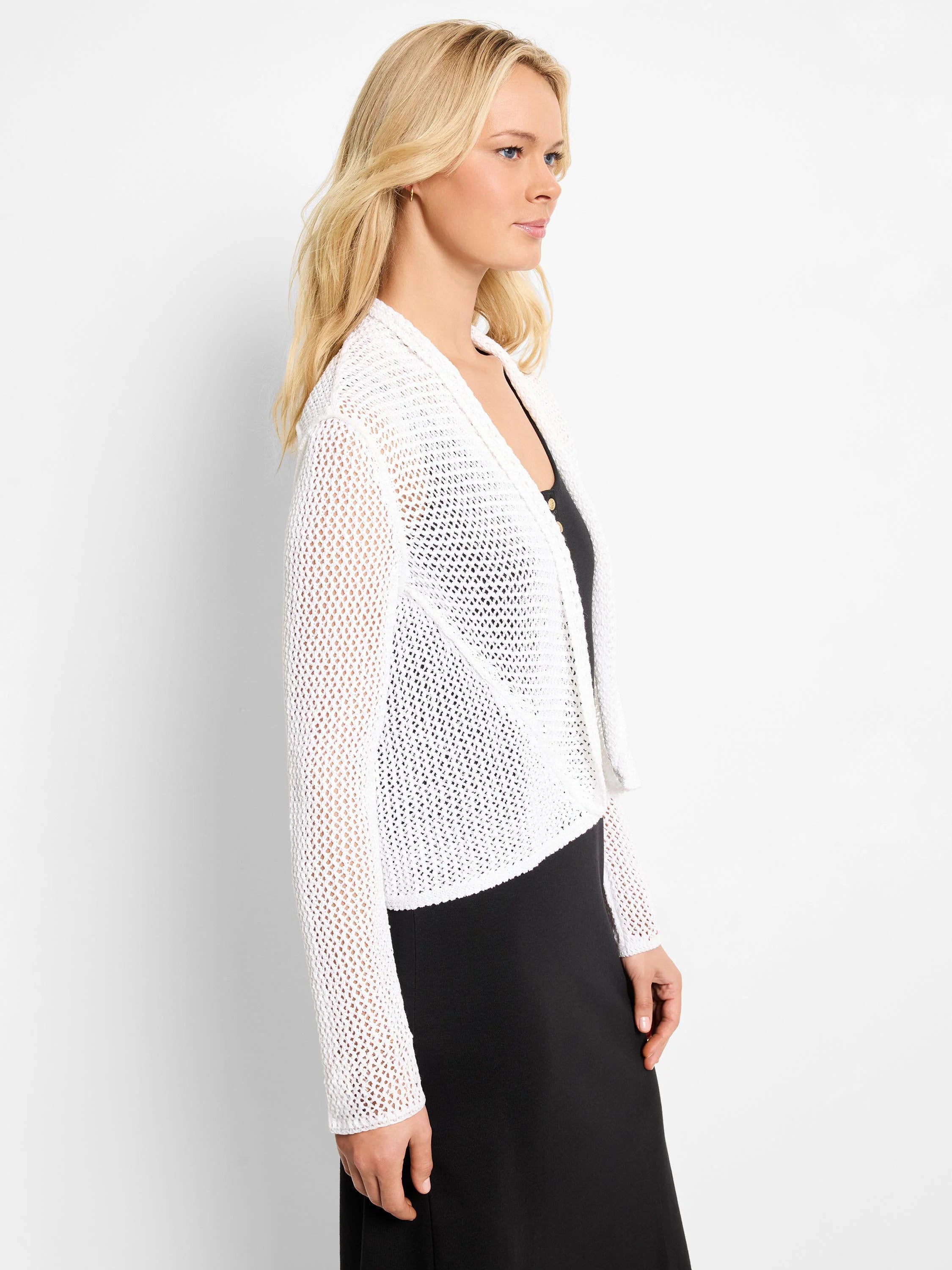 White open-knit mesh cardigan with a draped cocoon shape and long sleeves, worn open.