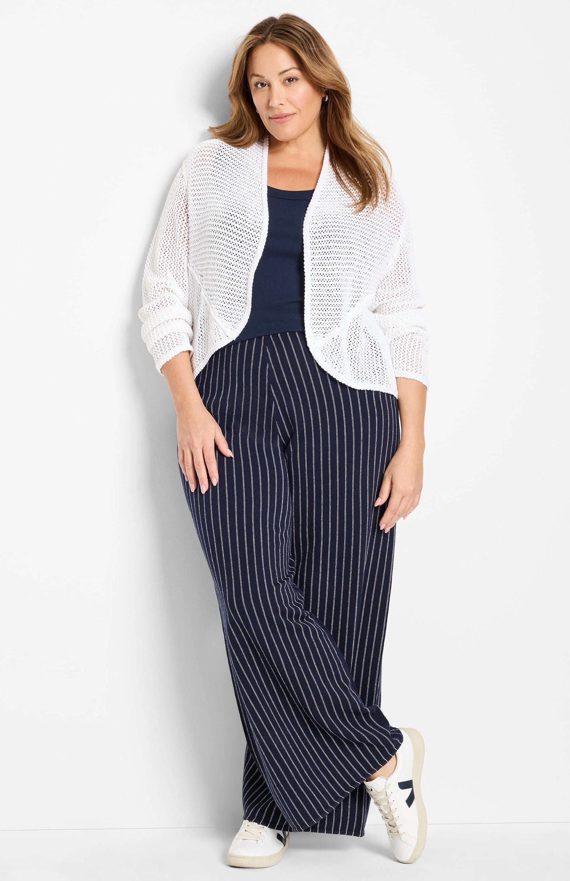 White mesh cocoon cardigan, open-front, with a visible open weave and draped fit.