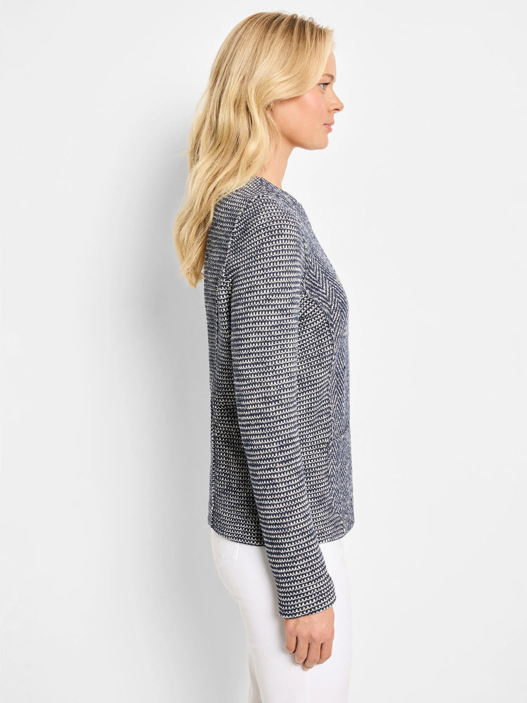 Navy and off-white woven knit jacket with fine overall texture and diagonal patterns on the sides.