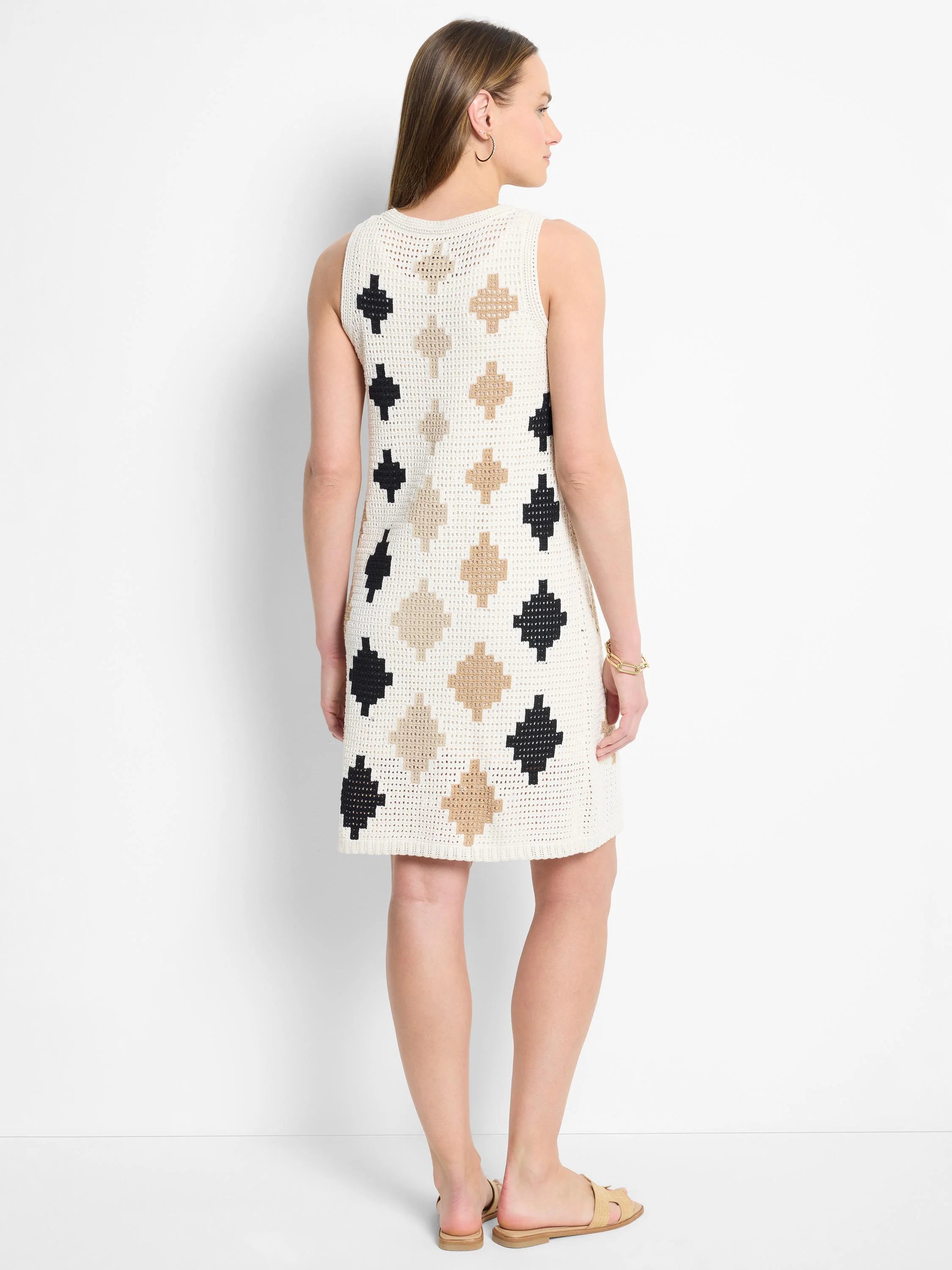 Cream crochet sleeveless dress. Black and beige diamond pattern.