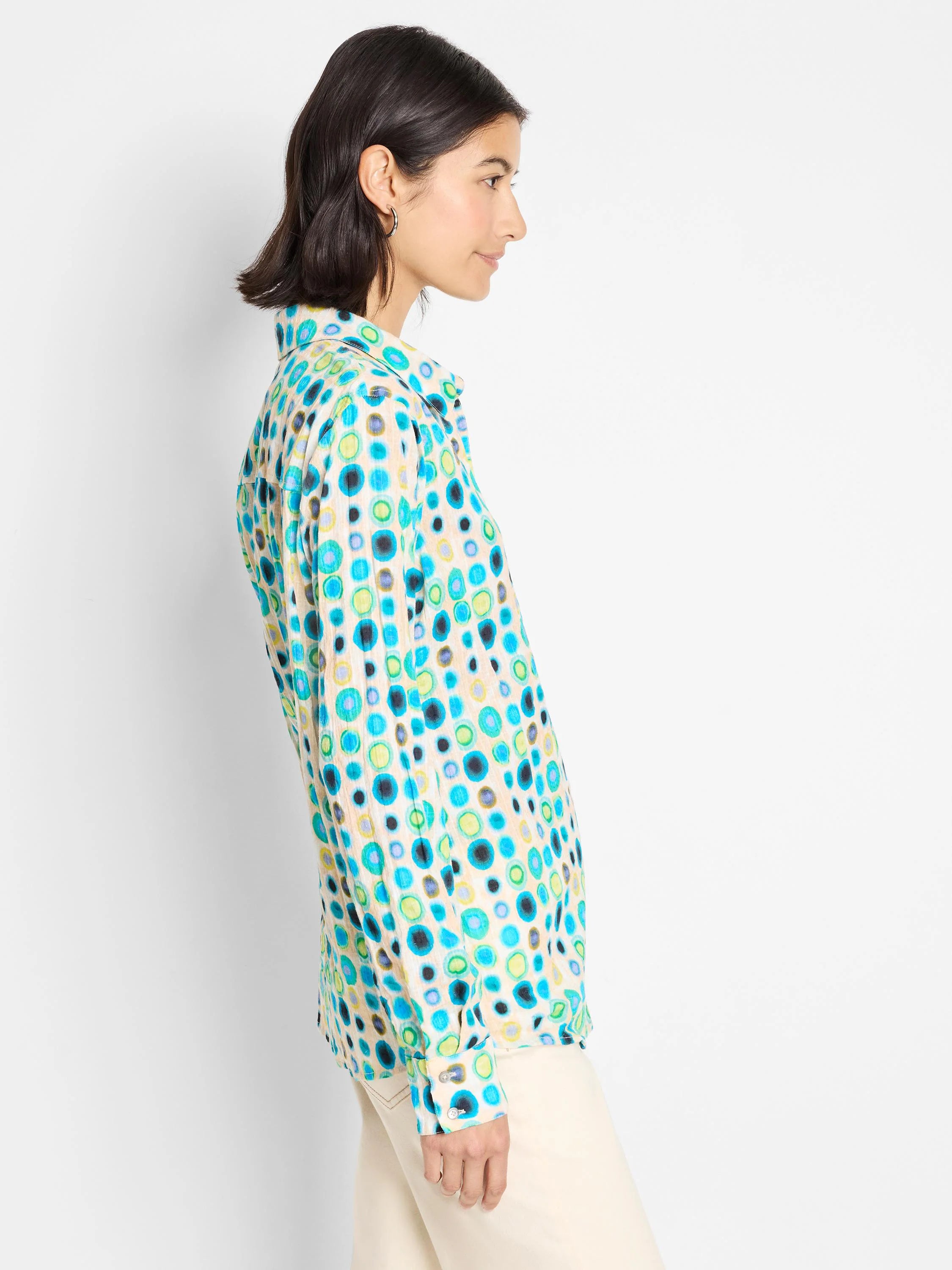 Cotton shirt, off-white background, teal, green, and black circles pattern. Long sleeves, collared.