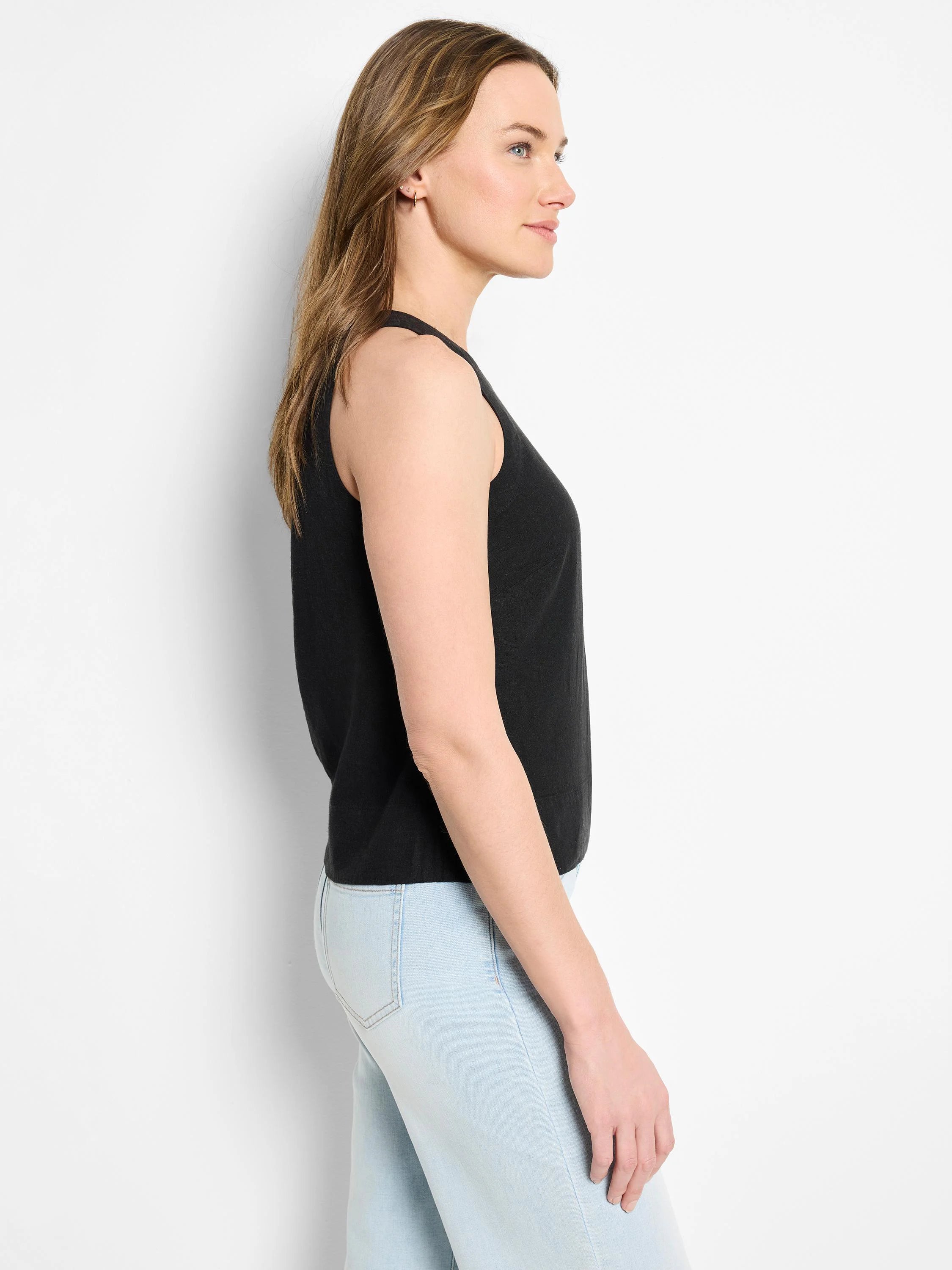 Black sleeveless linen tank top, shown on a model.