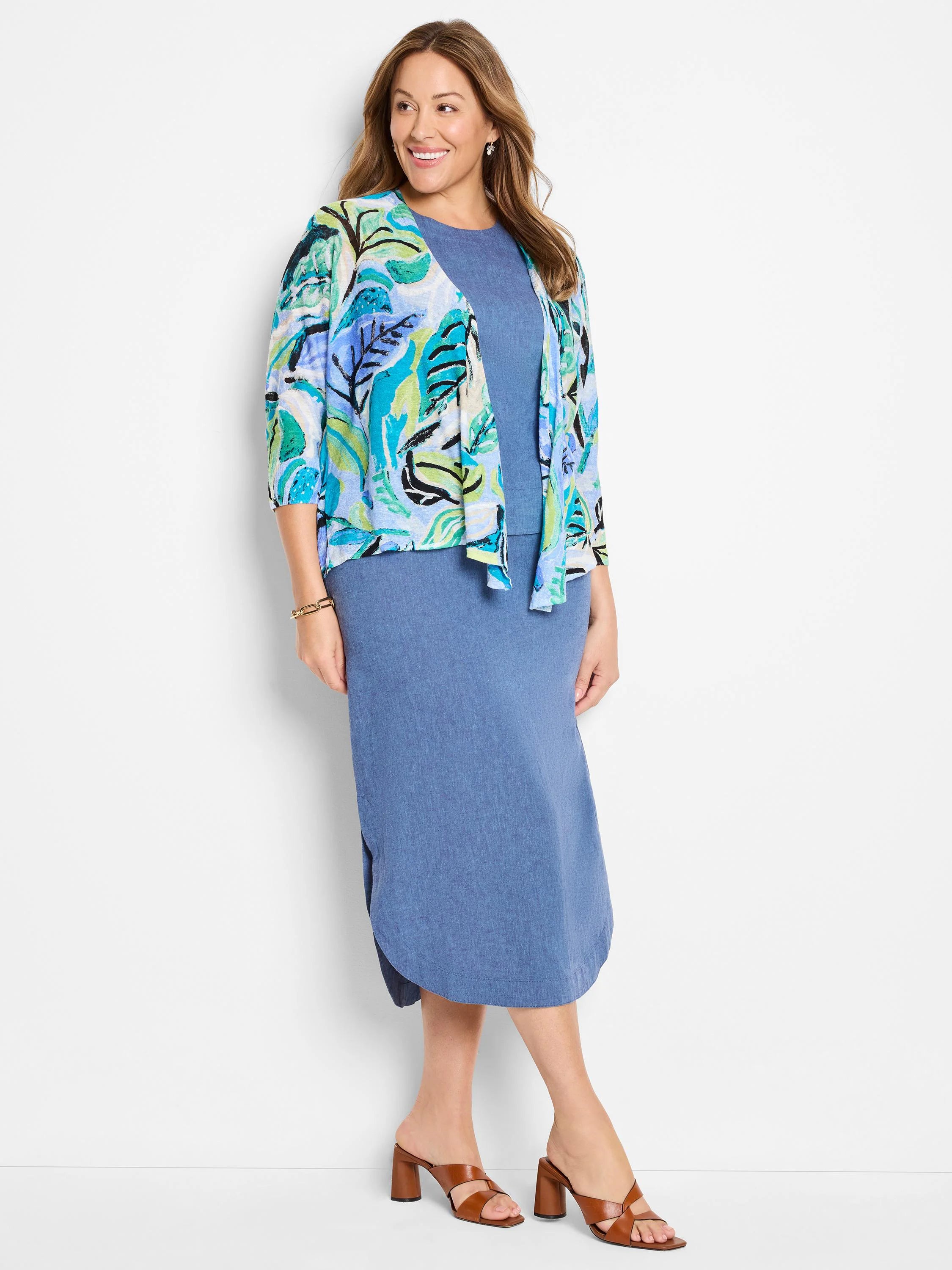 Blue linen midi dress with a teal, green, and white abstract print 3/4 sleeve jacket.