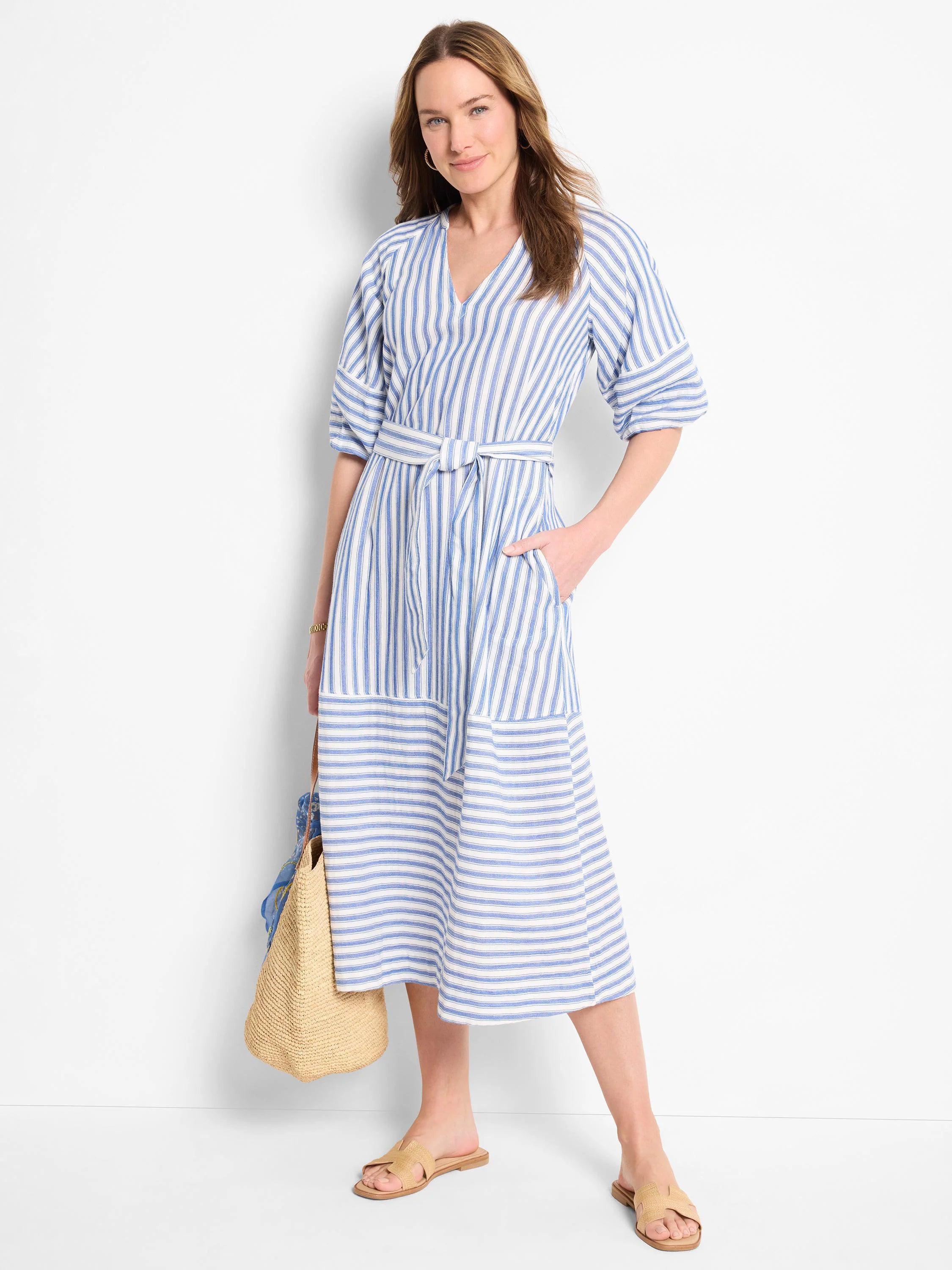 Blue and white striped midi dress with a V-neck, 3/4 sleeves, and a self-tie belt. A-line skirt.