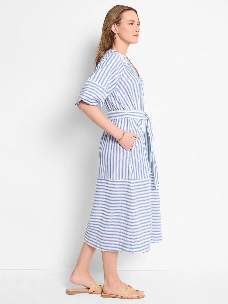 Blue and white vertical striped midi dress with a self-tie belt. Three-quarter sleeves.