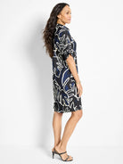 Midnight Muse Devon Dress:  Black dress with blue and off-white abstract leaf print. Short sleeves, knee-length.