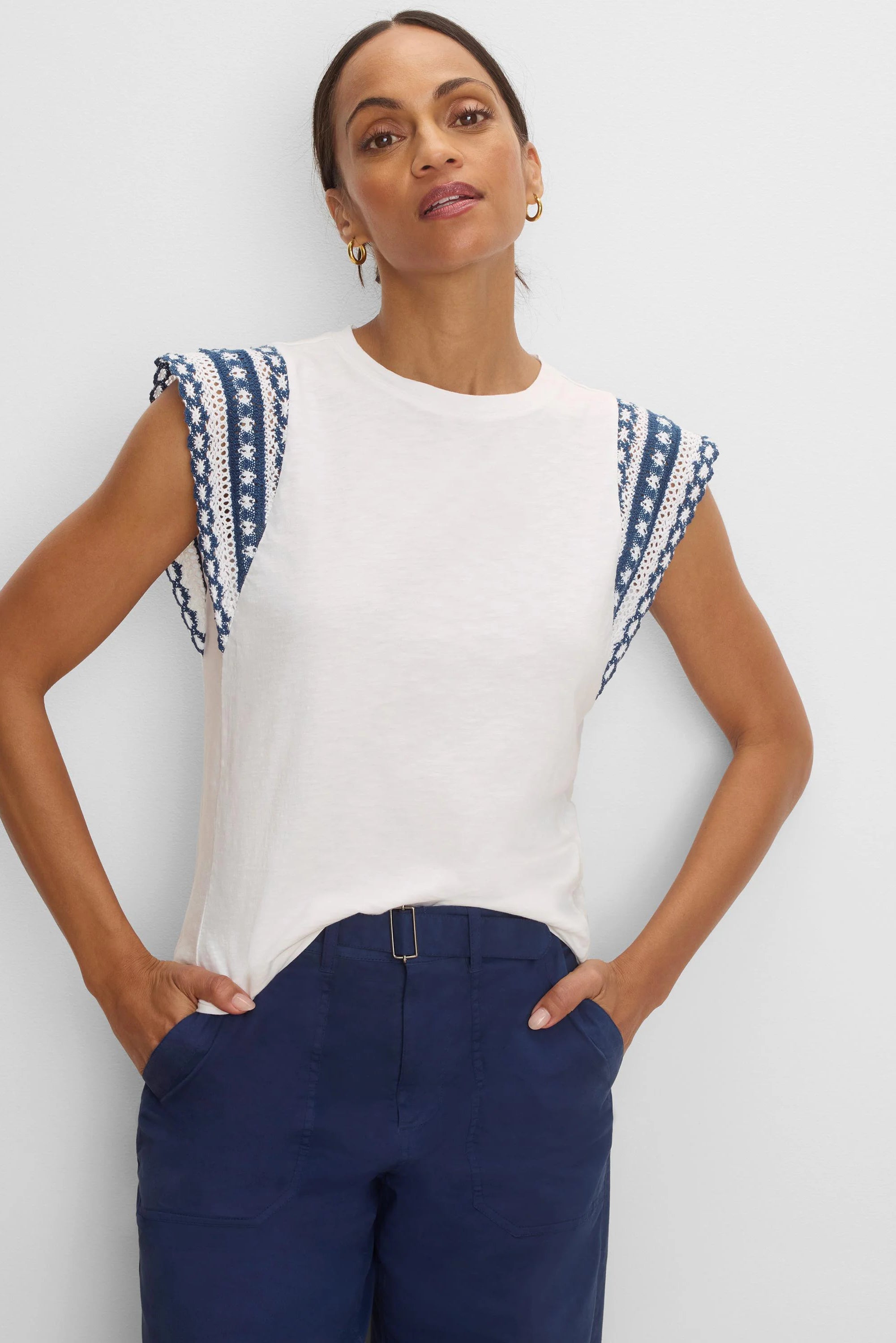 Off-white cotton slub top, crew neck, with navy & white patterned knit shoulder trim.