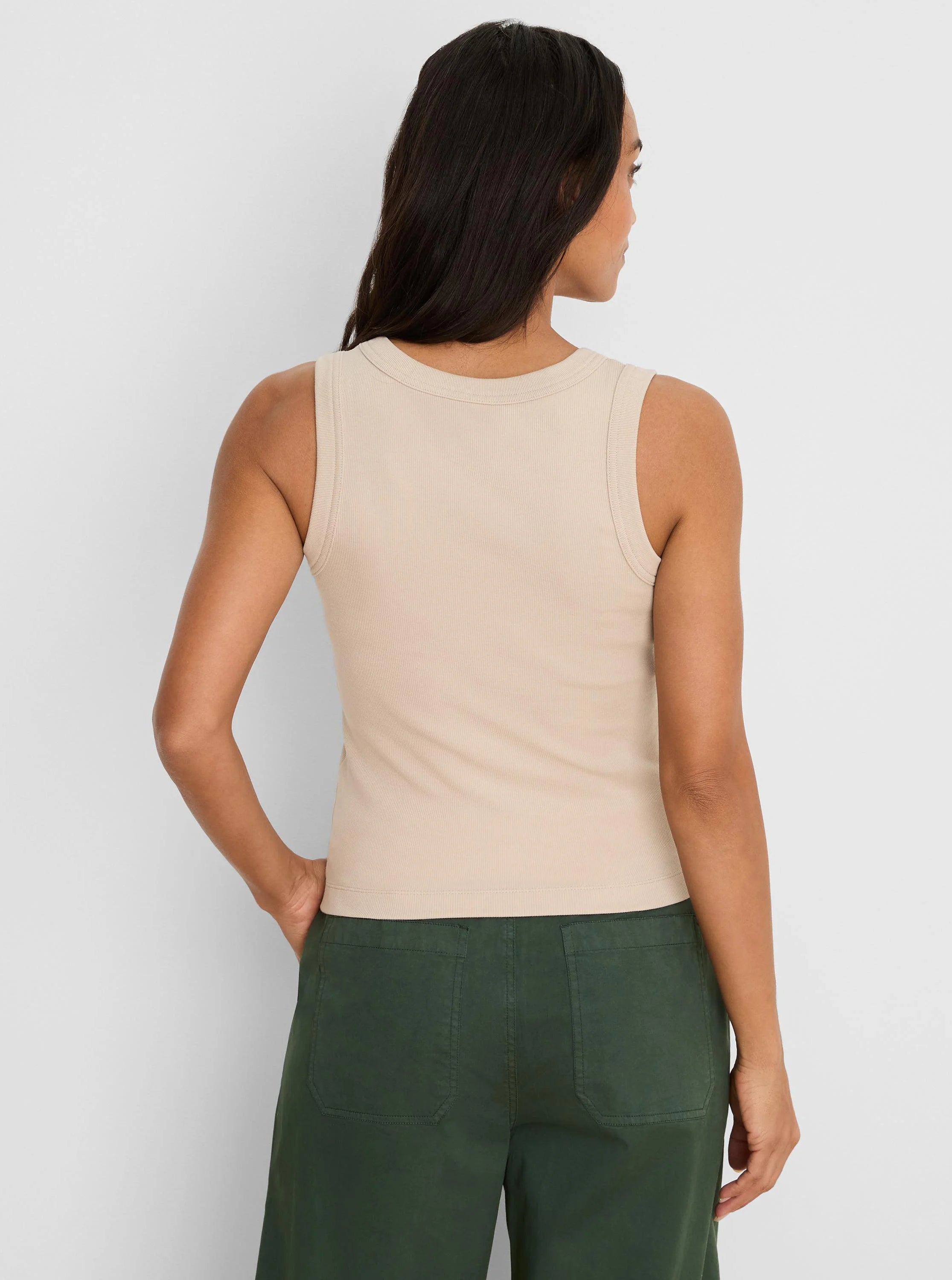 Light beige ribbed knit tank top, back view, with a rounded neckline.