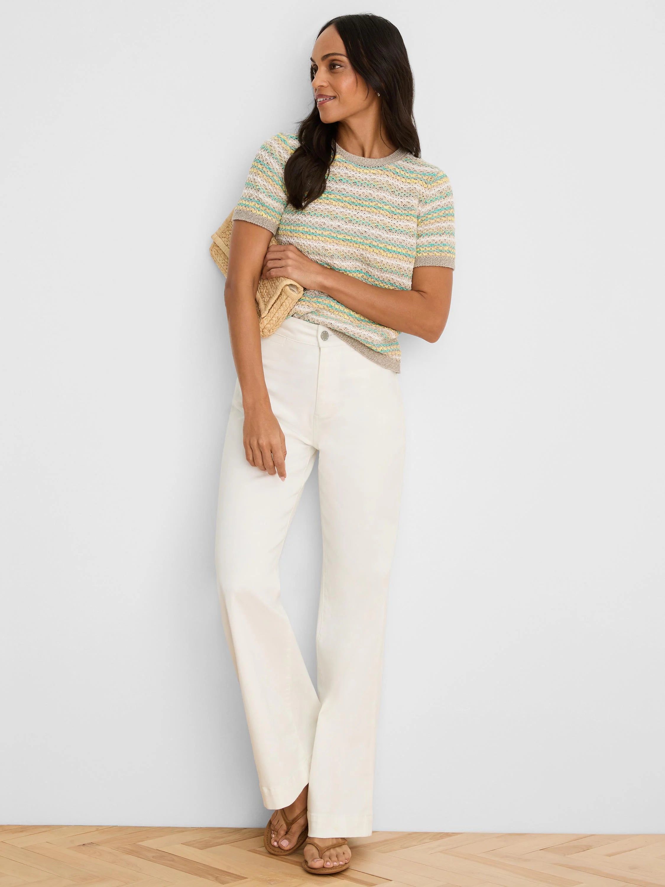 Layered knit tee with horizontal stripes in beige, pale yellow, and light green. Short sleeves, crew neck.