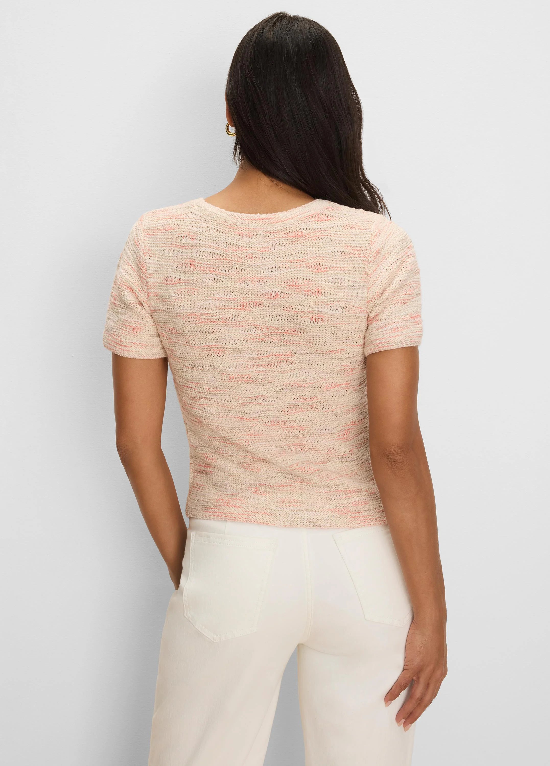 Short-sleeved cream sweater tee with textured wavy knit in pink and grey horizontal stripes.