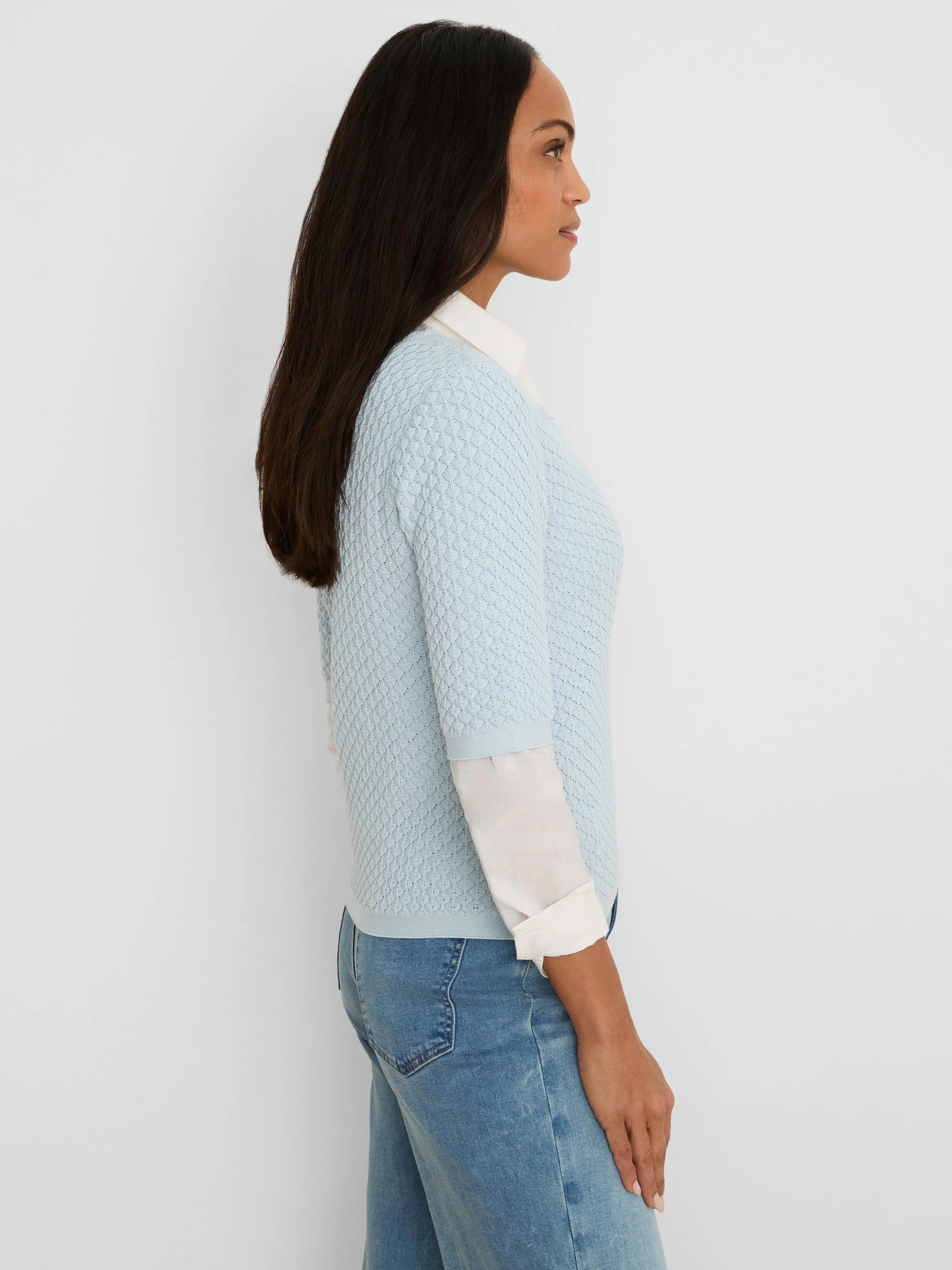 Pale blue scallop texture sweater tee with 3/4 sleeves, shown over a white collared shirt.