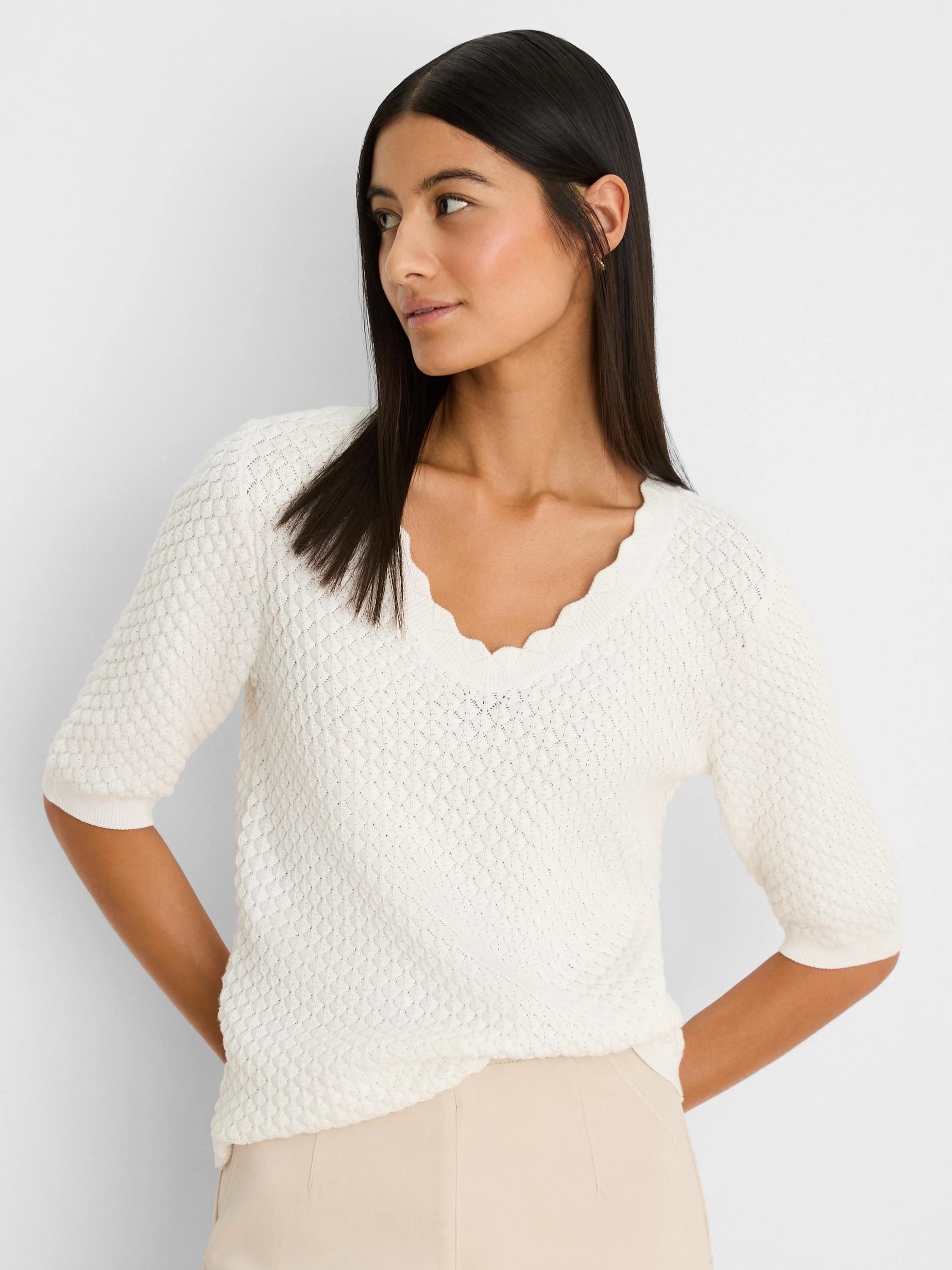 Off-white scallop knit sweater tee with a scalloped V-neck and elbow-length sleeves.