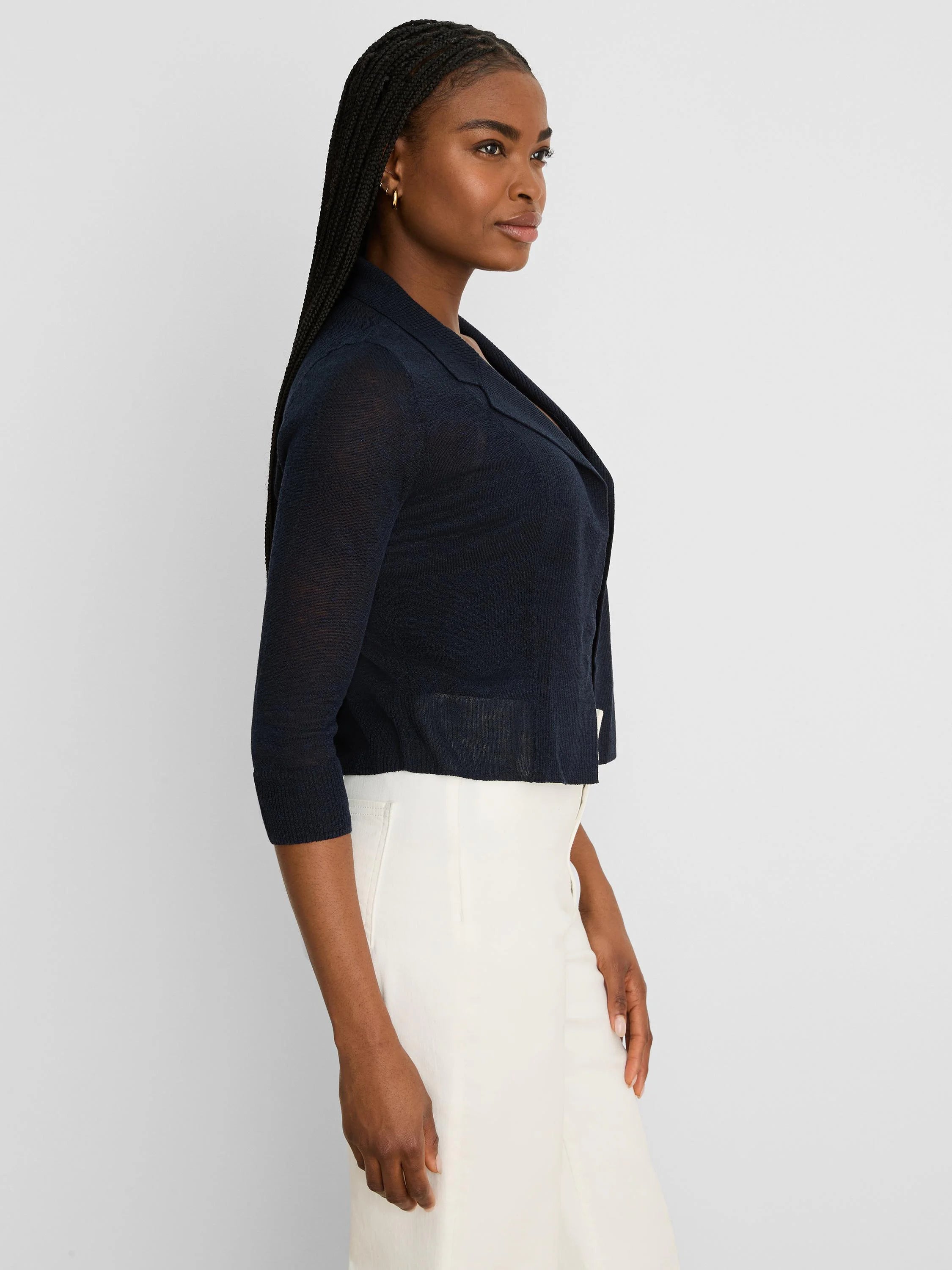 Navy blue featherknit collared cardigan with 3/4 sleeves and a cropped length, shown on a model.