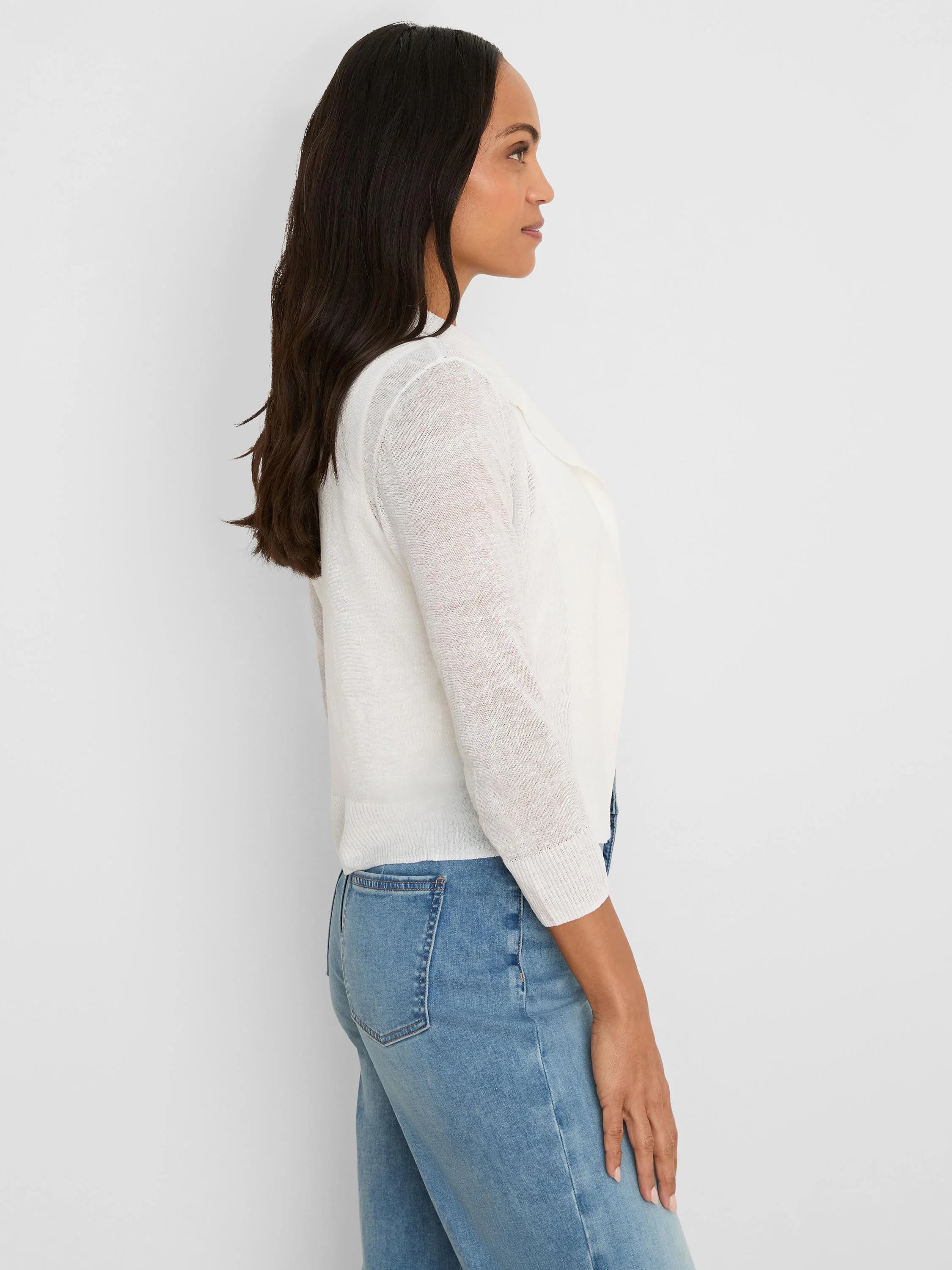 White collared featherknit cardigan with 3/4 sleeves and ribbed cuffs & hem.