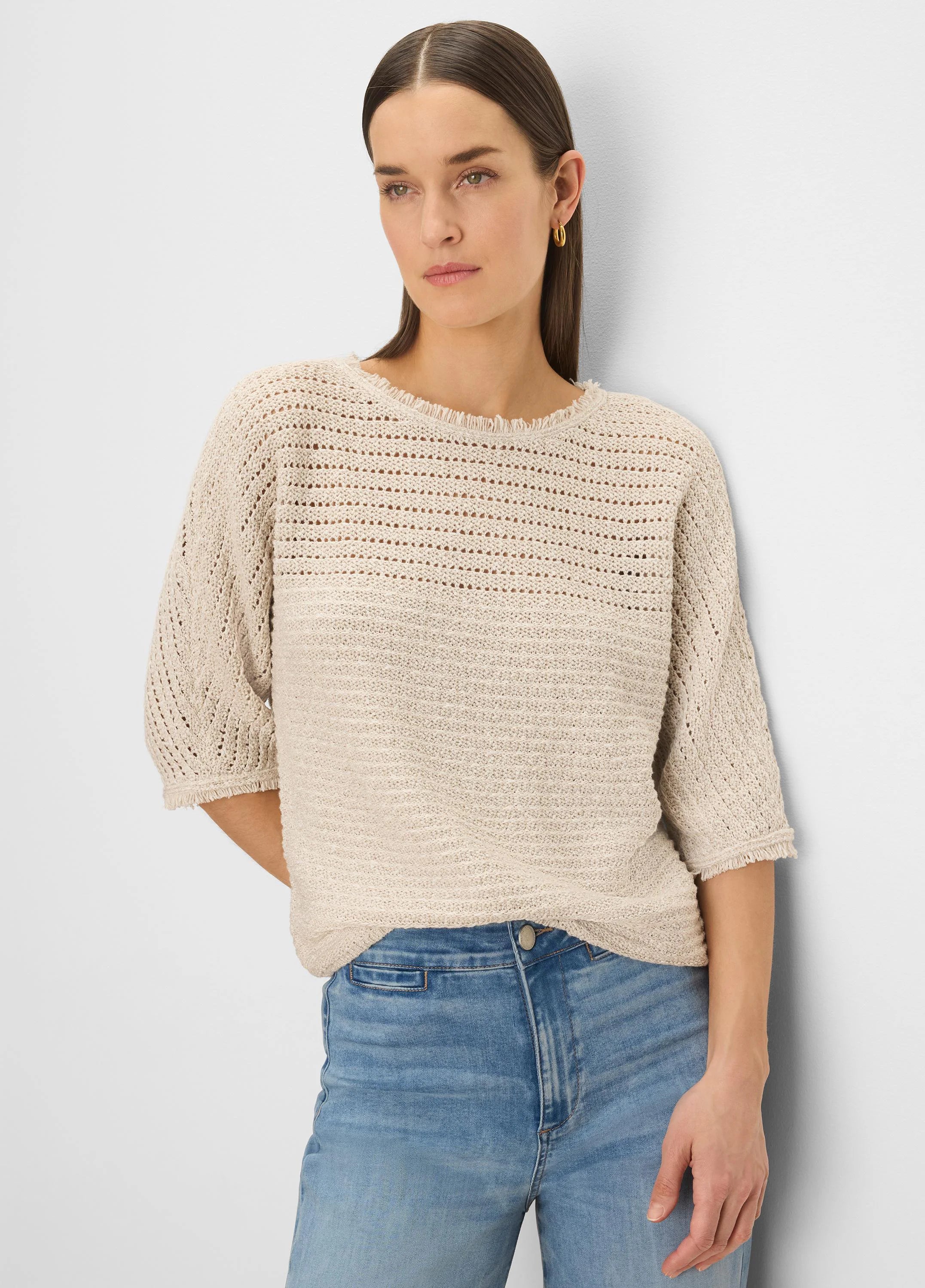 Oatmeal open-knit sweater with tonal textures, frayed neckline & 3/4 sleeves with frayed cuffs.