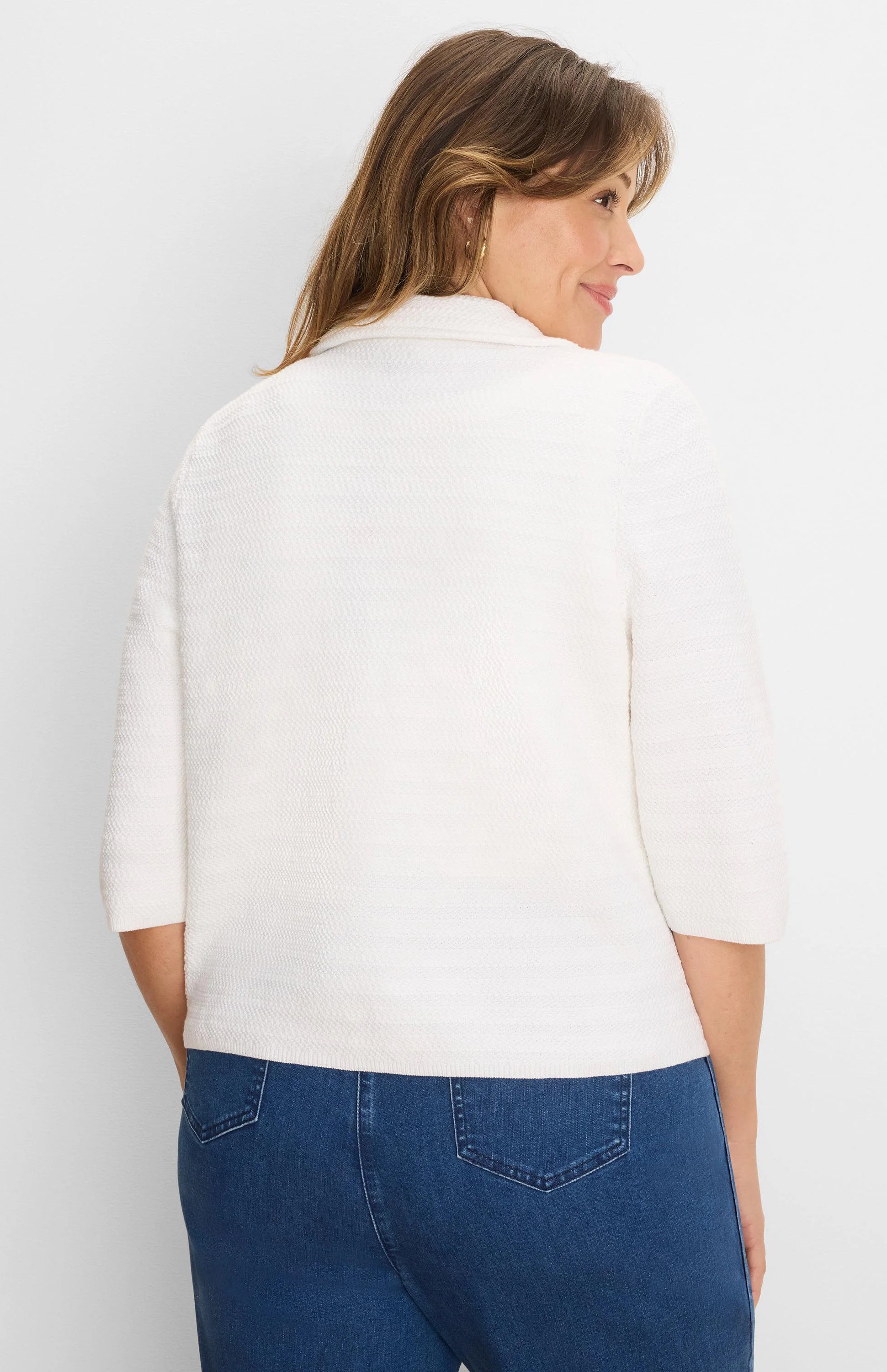 White textured knit jacket with elbow sleeves and a collar, shown from the back.