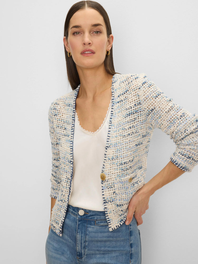 Knit jacket: textured blend of cream, light blue, & navy yarns. Open front, navy trim, 3/4 sleeves, decorative tan buttons.