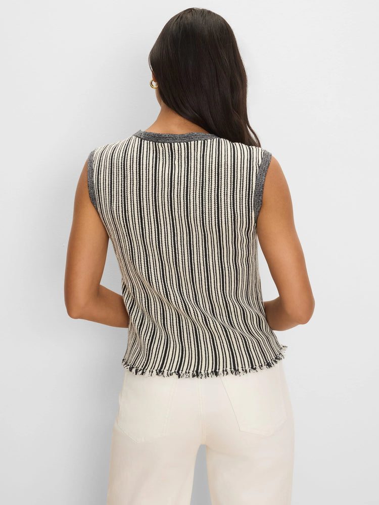Sleeveless sweater with alternating cream & black vertical stripes, dark grey ribbed trim, and a frayed hem.