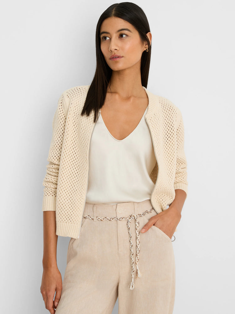 Cream open-knit mesh cardigan with silver zip front, ribbed cuffs and hem.