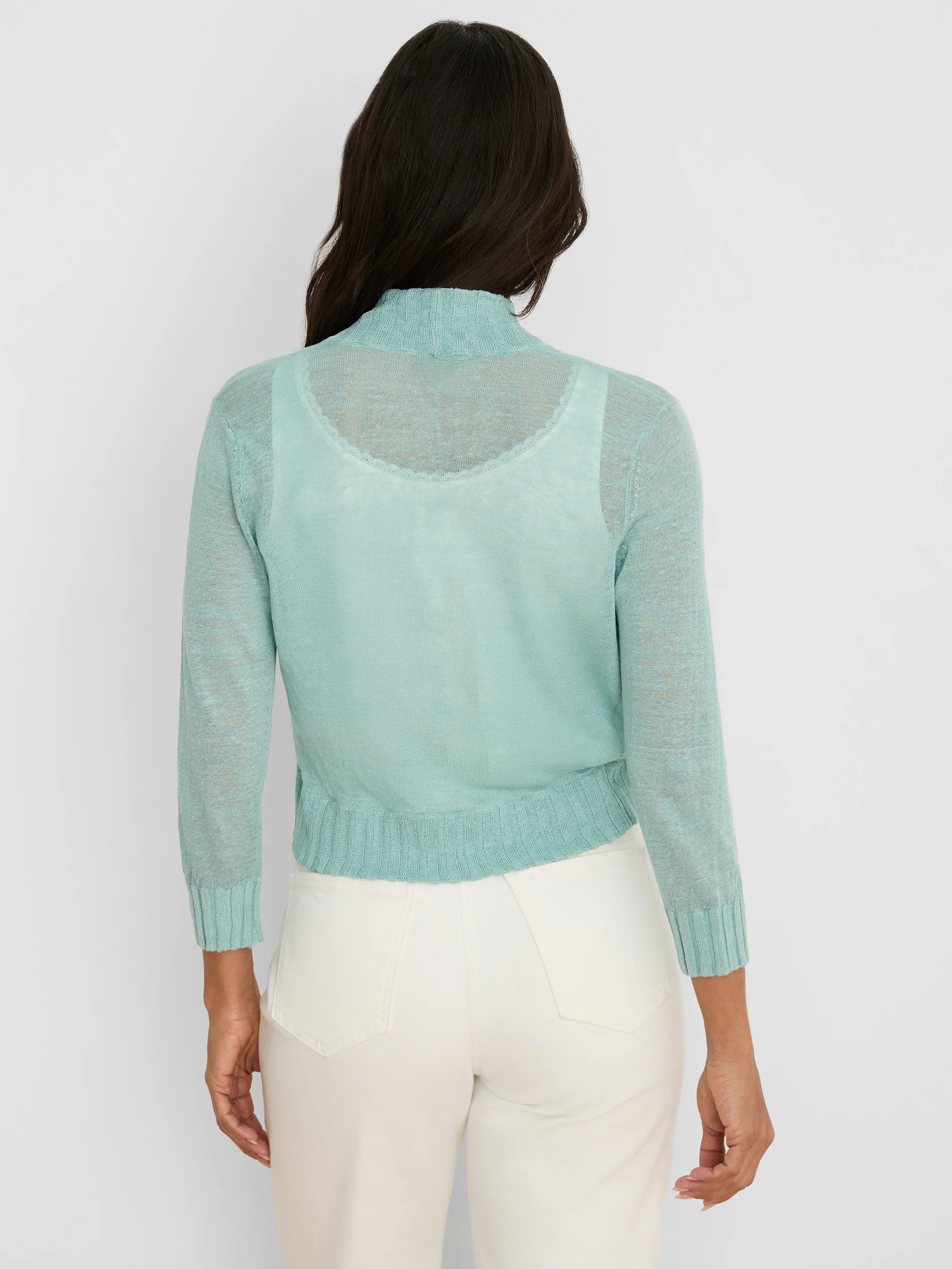 Mint green sheer bolero cardigan with high neck, long sleeves, and ribbed trim.