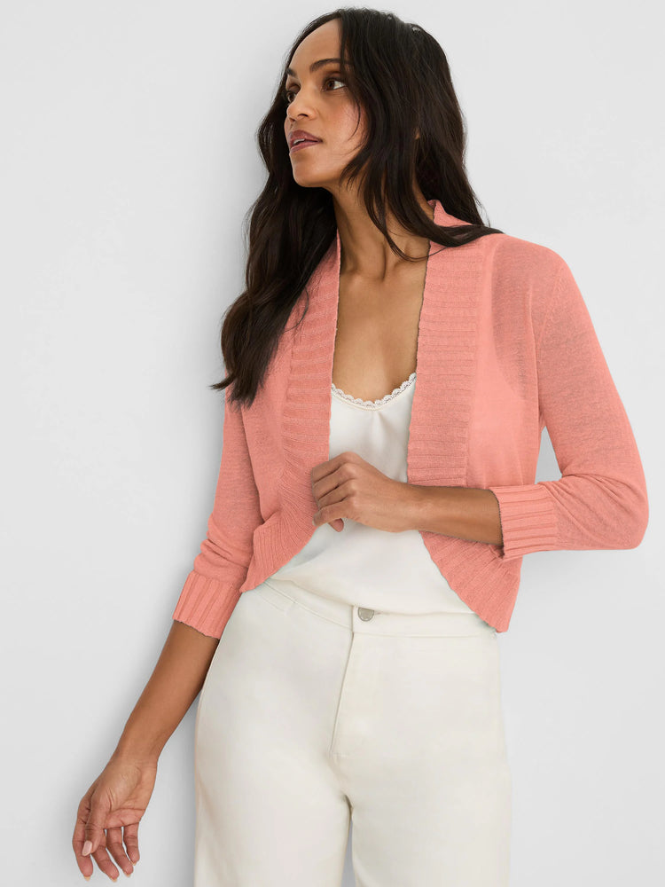 Coral pink bolero cardigan with 3/4 ribbed sleeves and an open front.