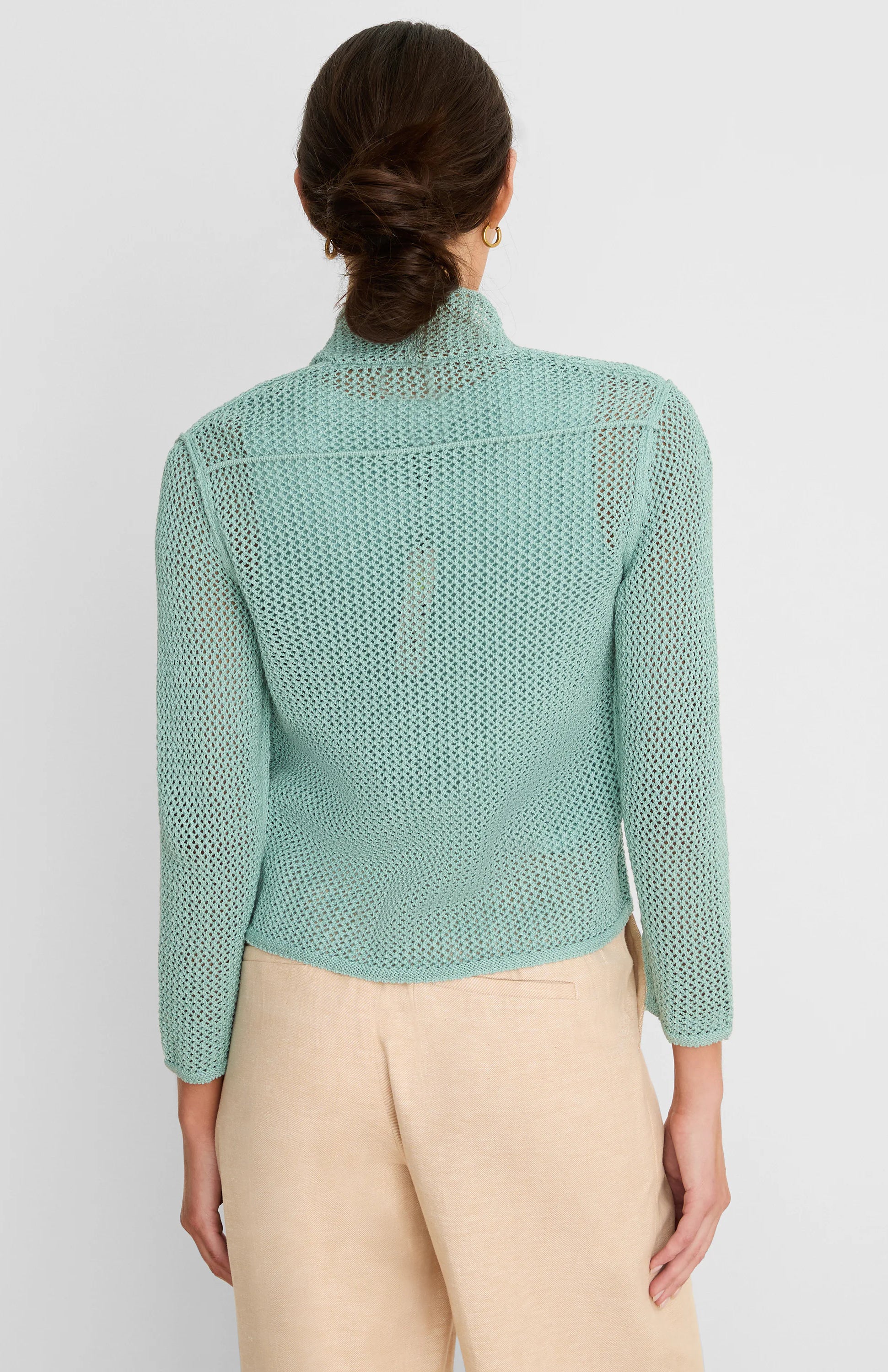 Mint green open-knit mesh cardigan with a relaxed cocoon fit, shown from the back.