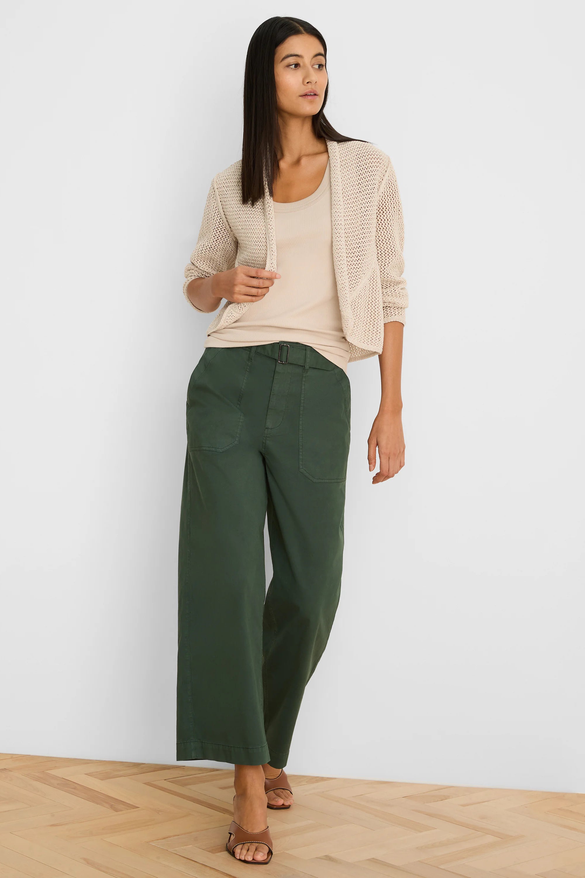 Light beige open-front mesh cocoon cardigan with a visible loose, airy knit texture and relaxed, rounded drape.