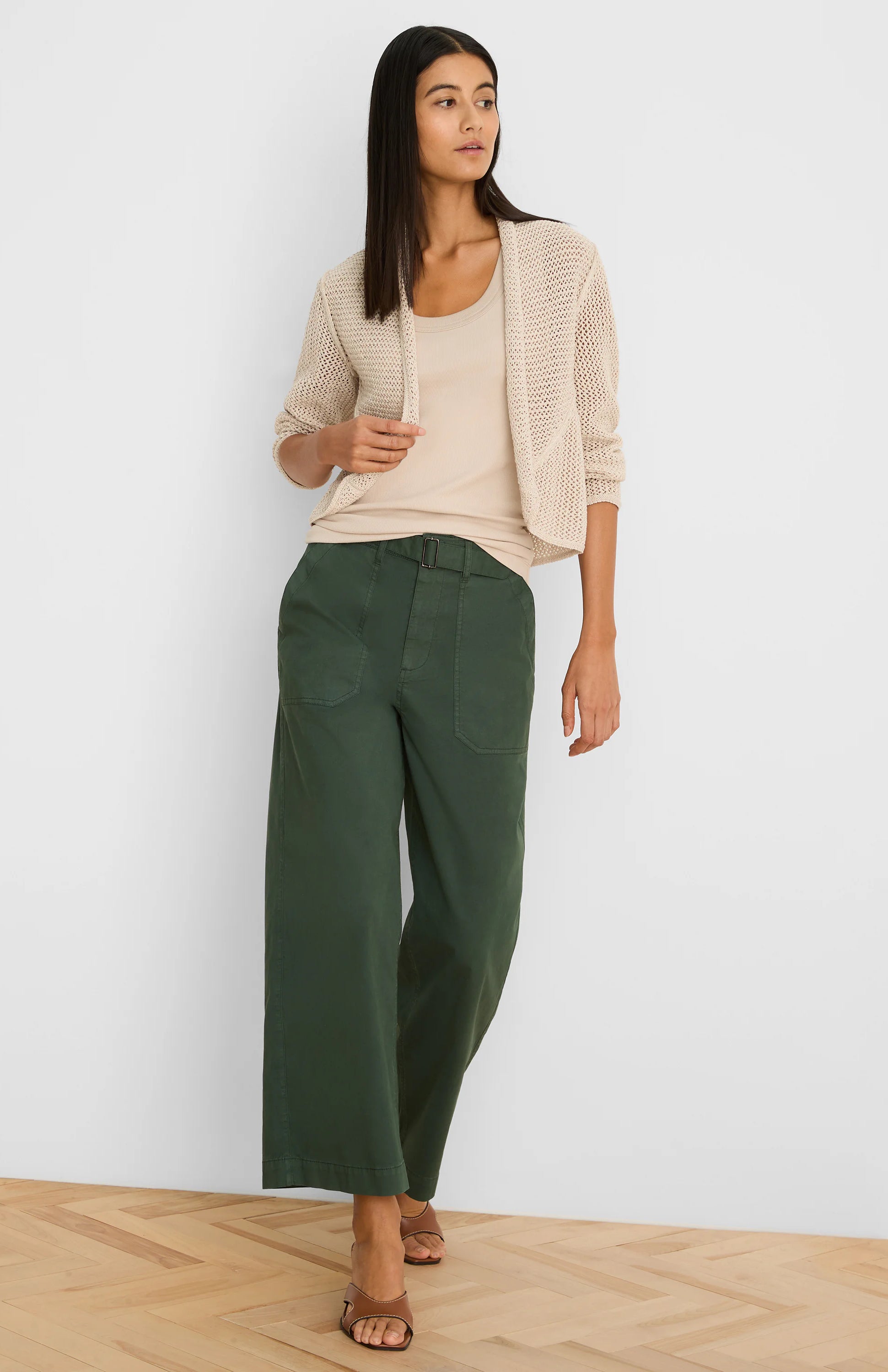 Light beige open-front mesh cocoon cardigan with a visible loose, airy knit texture and relaxed, rounded drape.