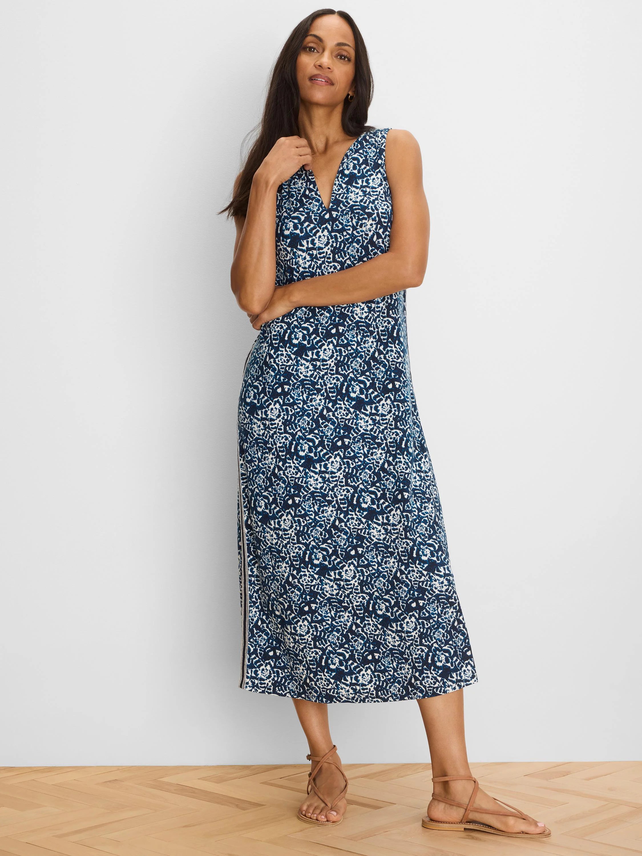 Blue and white shibori patterned sleeveless V-neck midi dress.