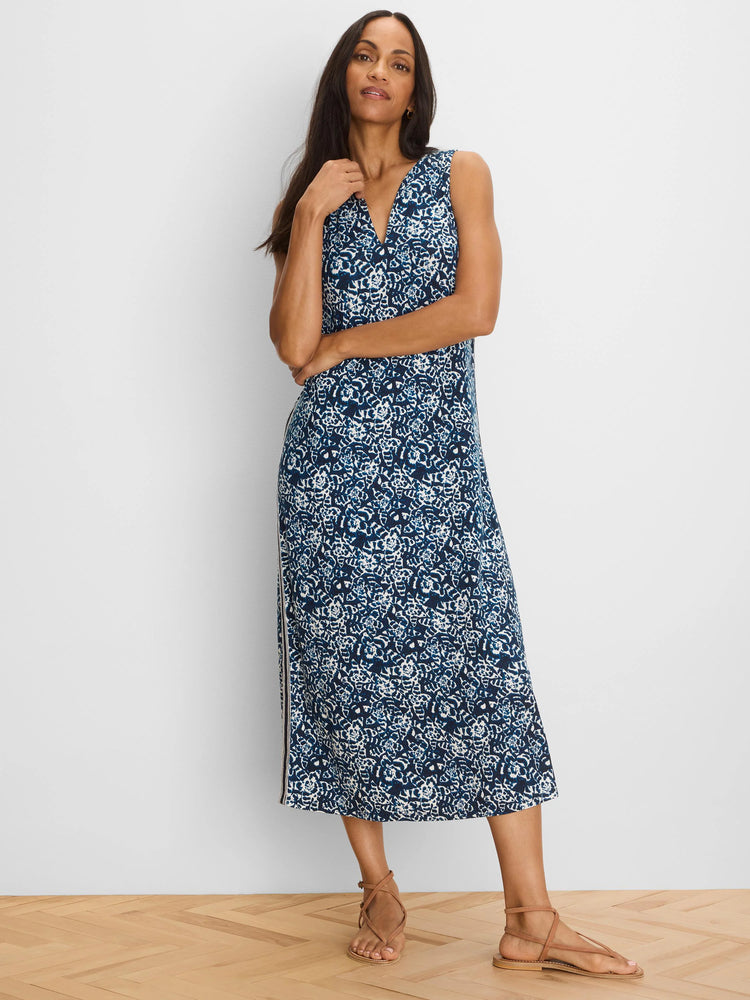 Blue and white shibori patterned sleeveless V-neck midi dress.