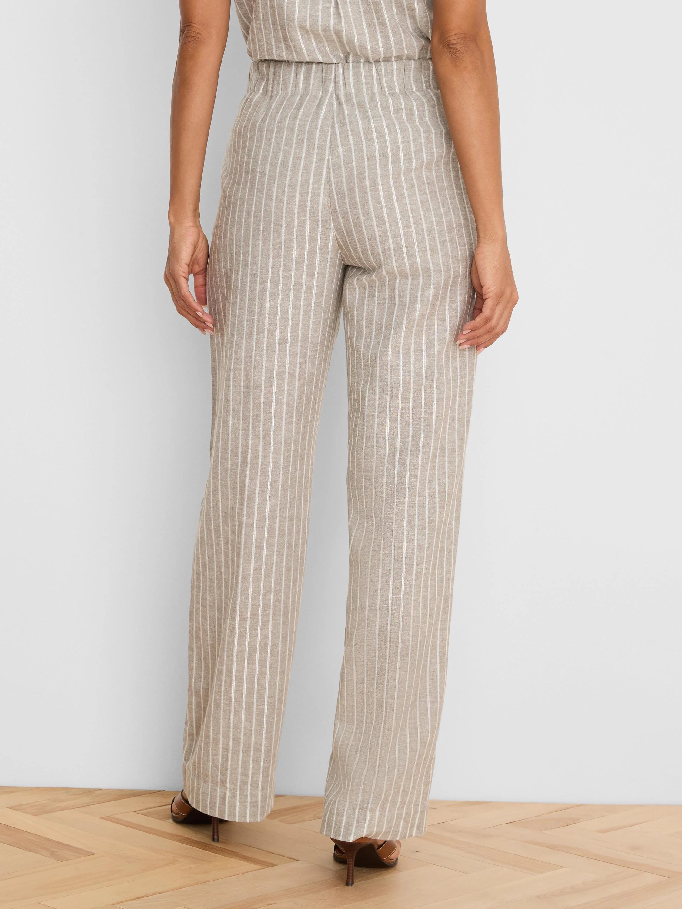 Light brown wide leg linen pants with white vertical stripes, elasticized back waist.