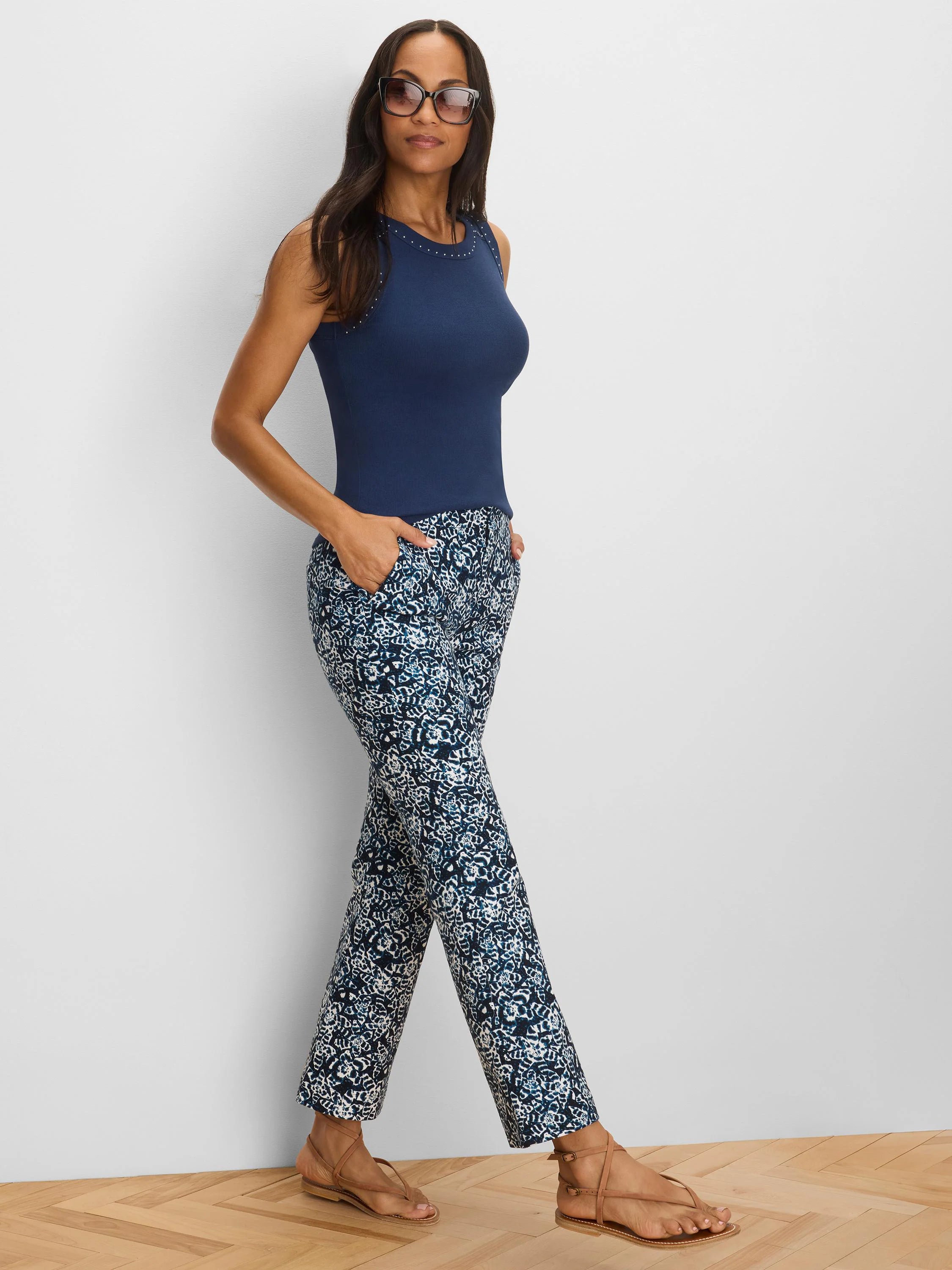 Dark blue & white shibori lily ankle pants. Fitted through hip & thigh, with a demi-boot leg.